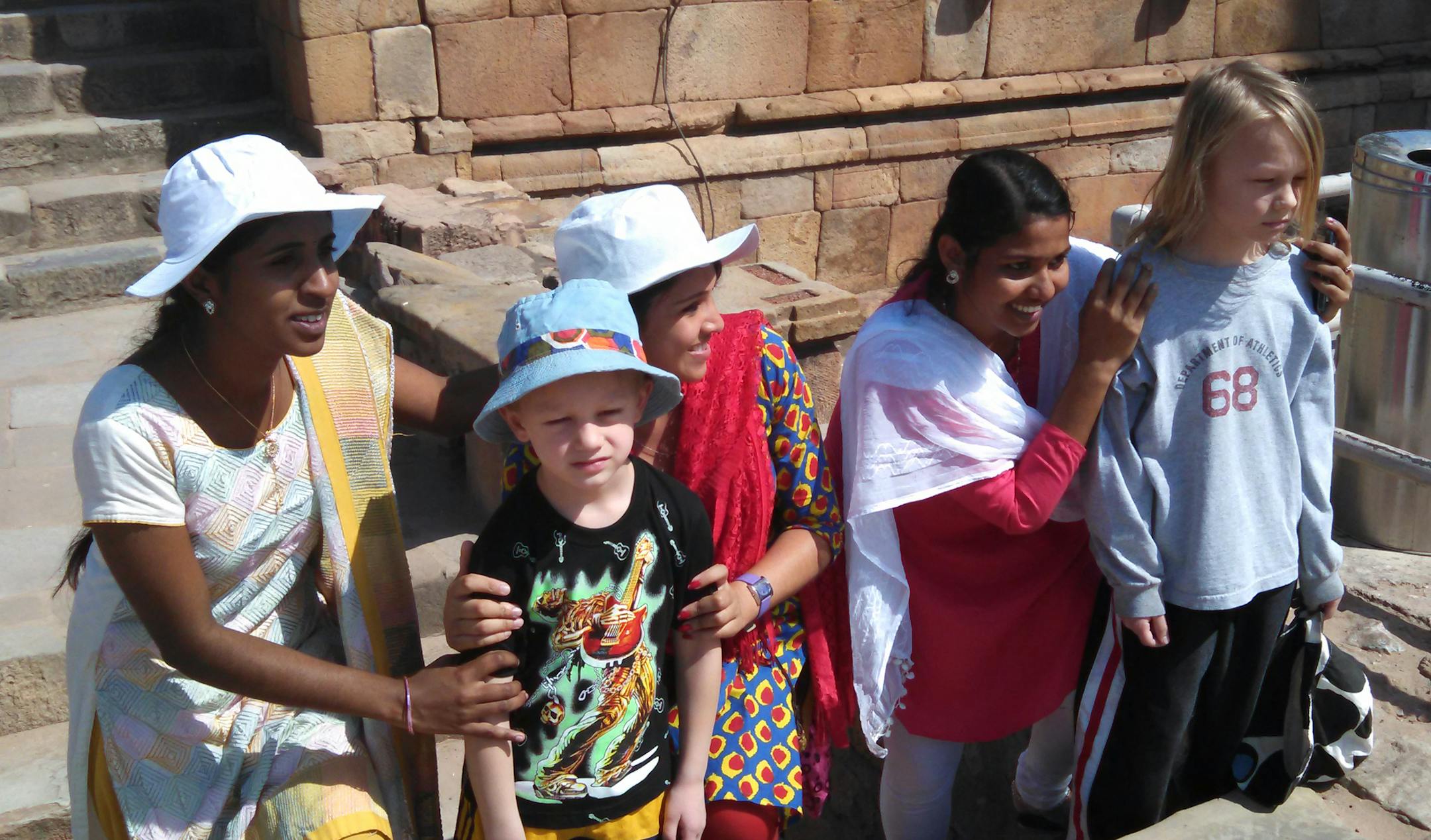 At the Qutub Minar complex in Delhi, Ellis and Theron Wangerin proved to be popular with Indian tourists.