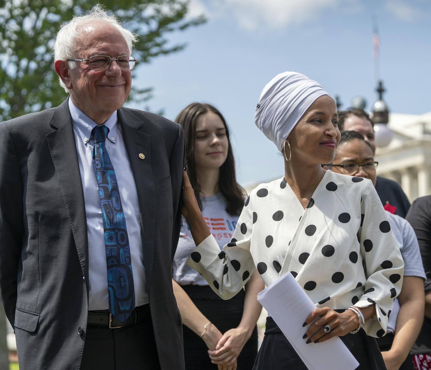 Democratic presidential candidate, Sen. Bernie Sanders, I-Vt., left, and Rep. Ilhan Omar, D-Minn., the sponsors of legislation to cancel all student loan debt, hold a news conference at the Capitol in Washington, Monday, June 24, 2019. (AP Photo/J. Scott Applewhite)