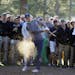 Jordan Spieth hits out of the rough off the 17th fairway during the third round of the Masters golf tournament Saturday, April 9, 2016, in Augusta, Ga