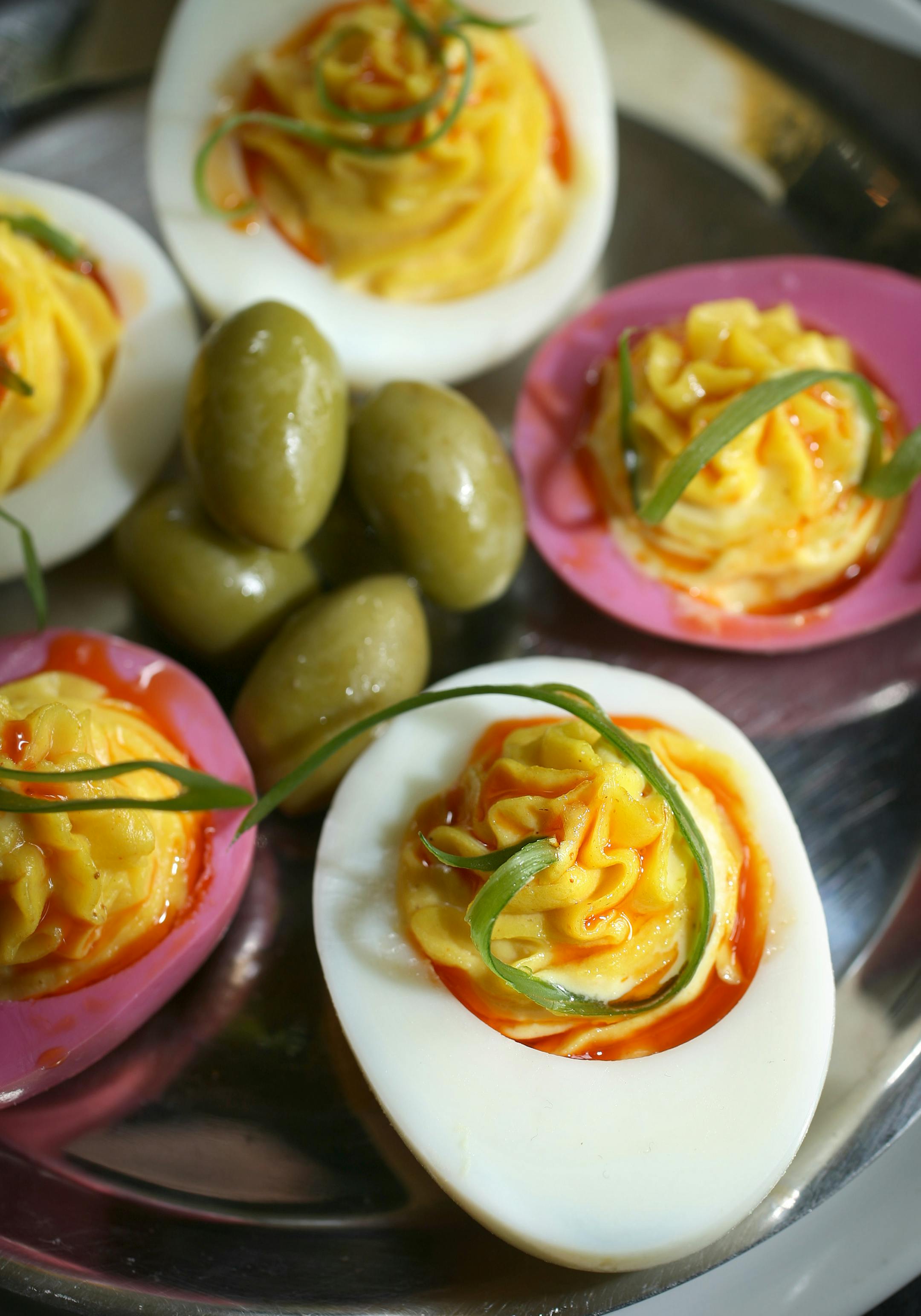 Deviled eggs spiced with chili oil and curry