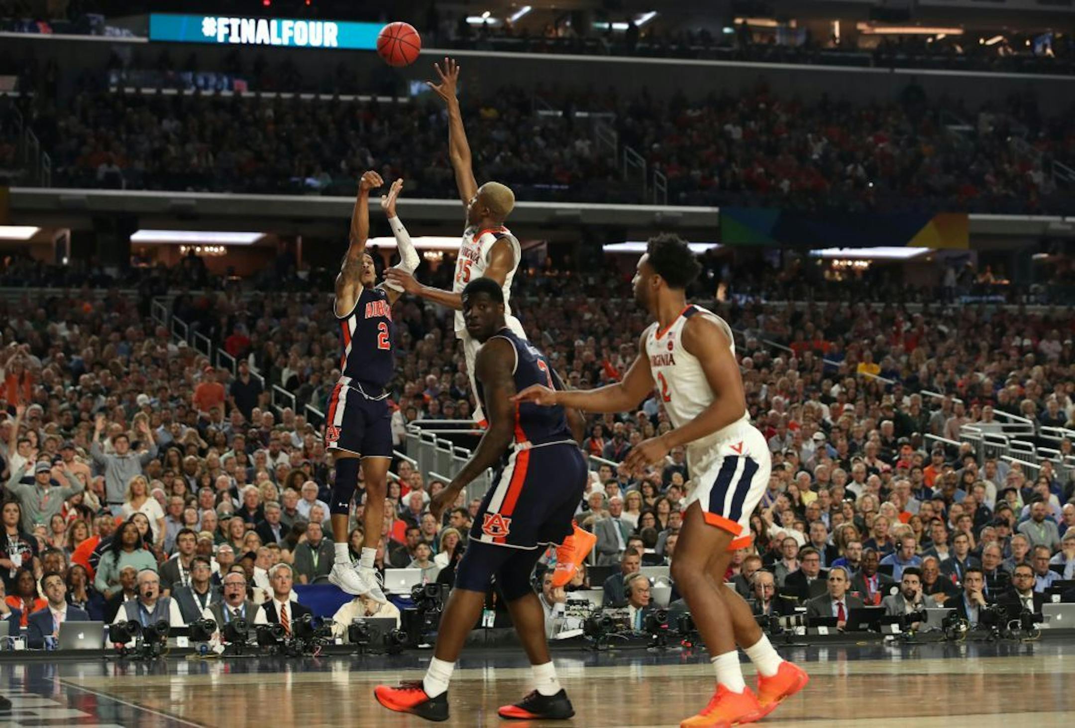 Auburn guard Bryce Brown (2) made a three point basket against Virginia Cavaliers forward Mamadi Diakite (25) during the second half.