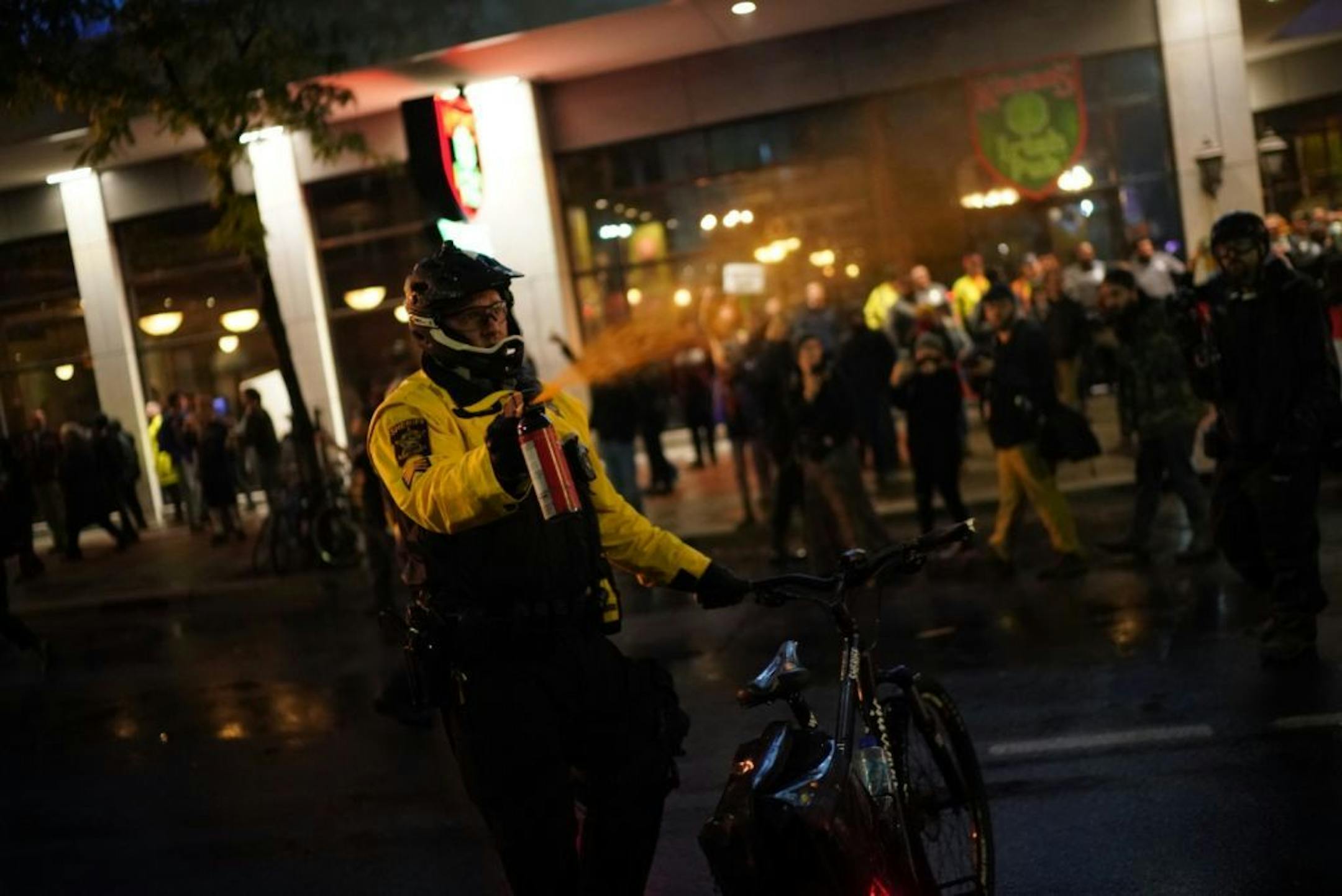 Minneapolis police sprayed tear gas to disperse protesters.