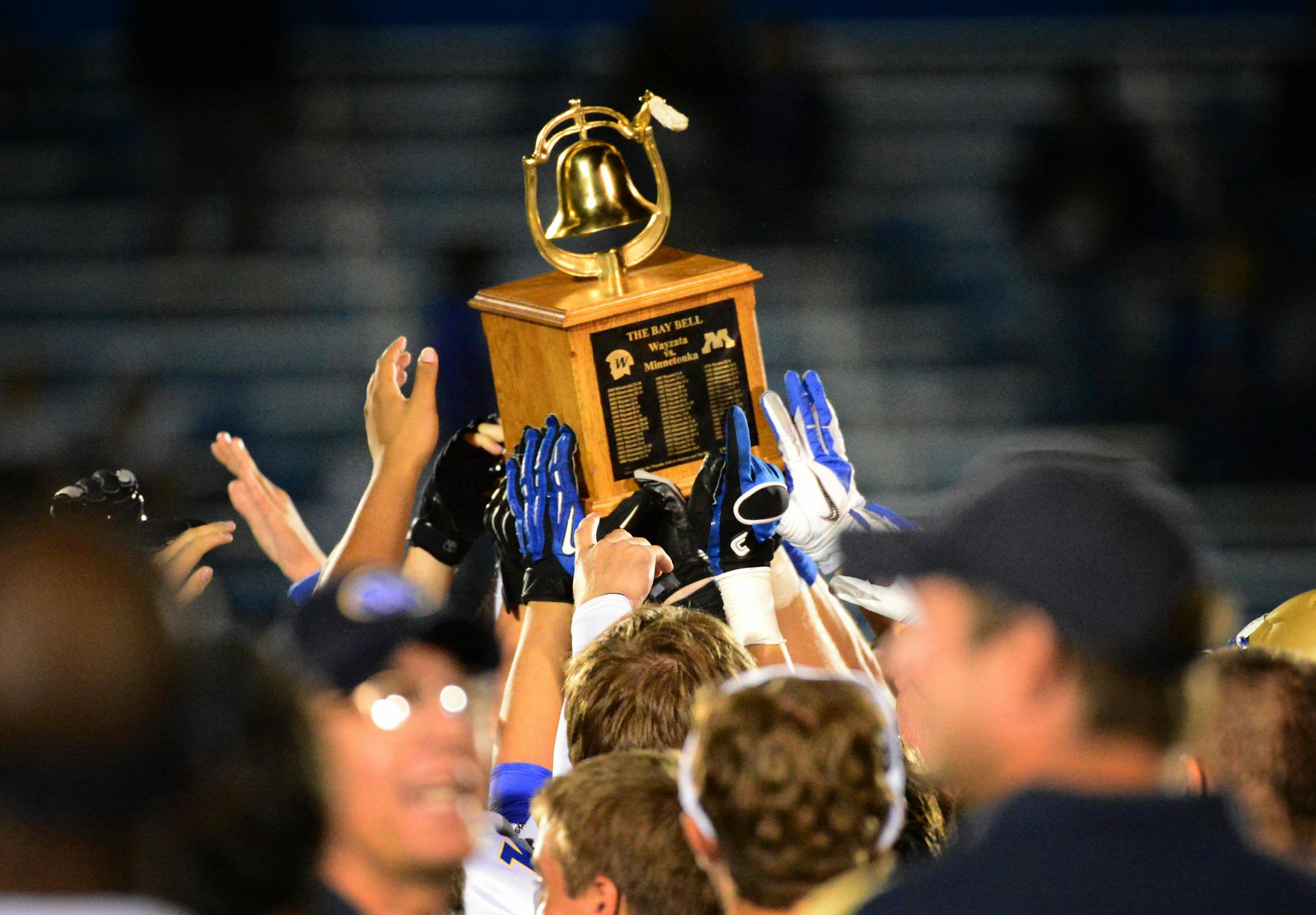 Wayzata and Minnetonka play annually for the Bay Bell Trophy