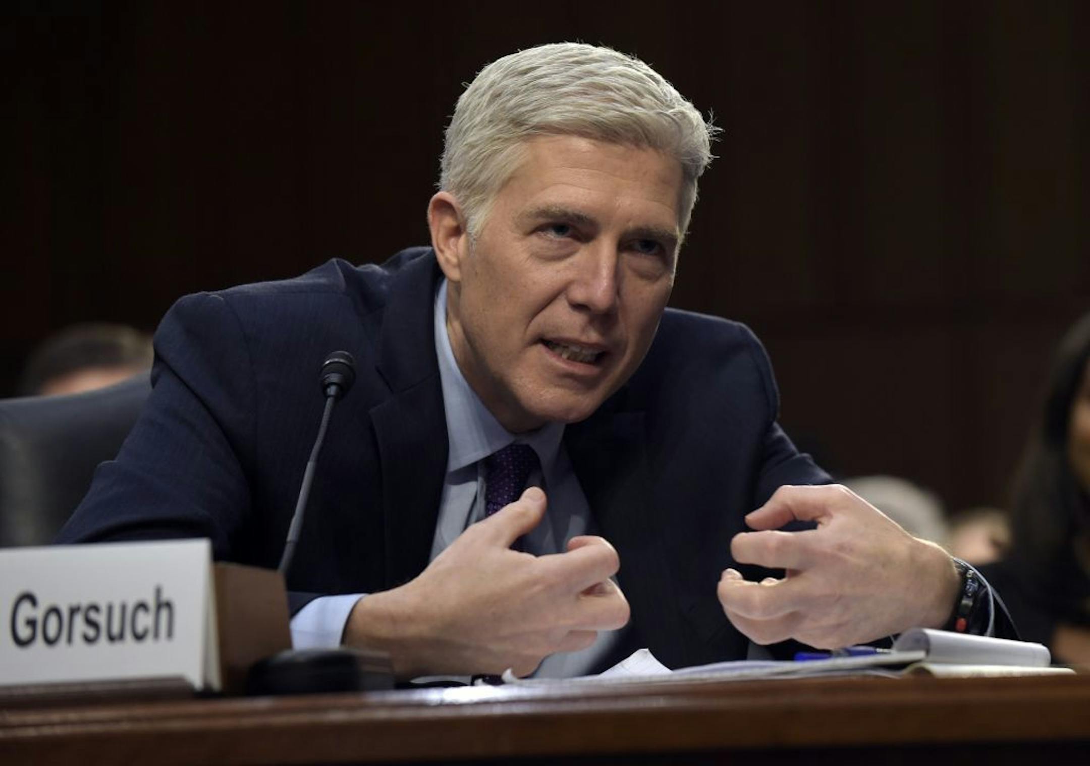 Supreme Court Justice nominee Neil Gorsuch explains mutton busting as he testifies on Capitol Hill in Washington, Tuesday, March 21, 2017, during his confirmation hearing before the Senate Judiciary Committee. Mutton busting is an event held at rodeos similar to bull riding or bronc riding, in which children ride or race sheep.