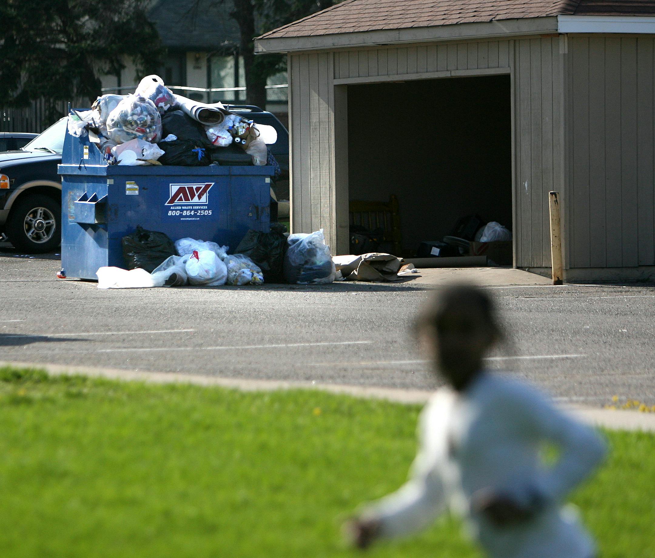 May 7, 2008 - Brooklyn Center, MN -Children played on the Center Pointe apartment complex in Brooklyn Center playground. City officials say North Oaks landlords Hyder and Asgher Jaweed are among the worst property owners they have seen because their large aprtment complexes have fallen into disrepair, including a broken playground, apartments that need repair, and overflowing garbage areas.