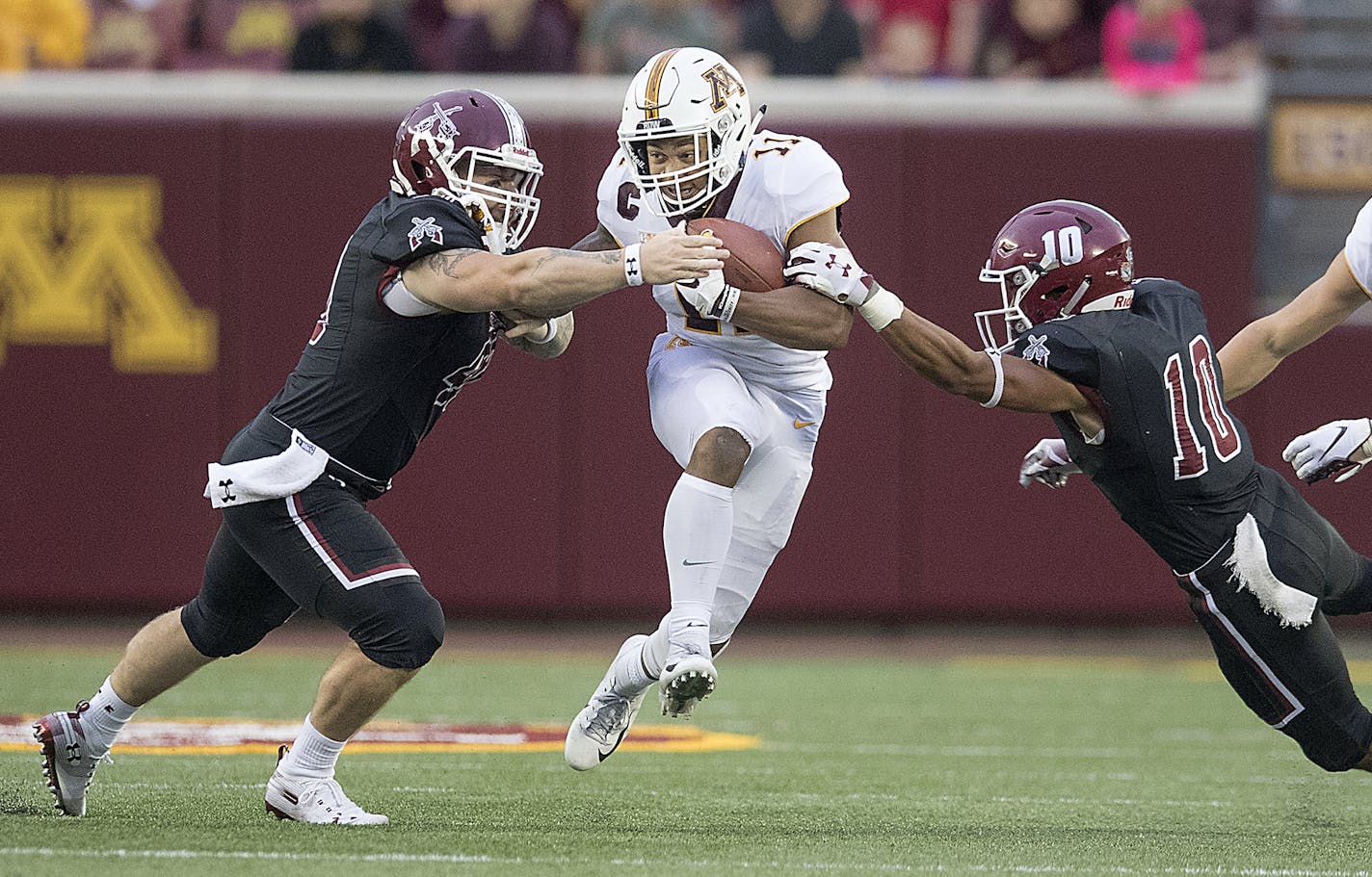 Minnesota defensive back Antoine Winfield Jr. broke away from New Mexico State's defense to return the punt 76 yards for a touchdown in the second quarter.