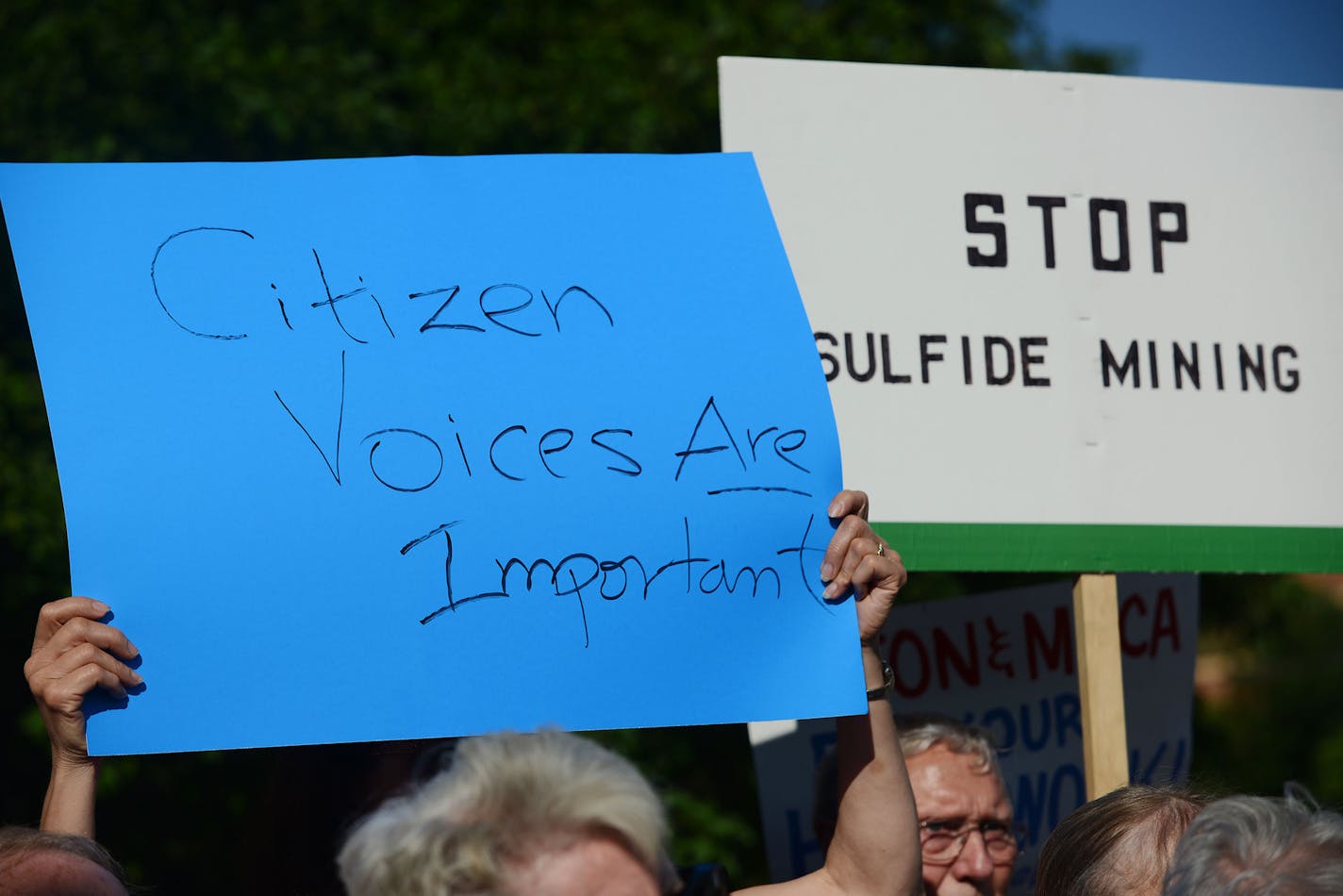 Signs were displayed during the press conference held outside of the Pollution Control Agency that fought against the Minnesota Pollution Control Agency Citizens' Board concluding. The press conference and final meeting was held in St. Paul, Minn., on Tuesday June 23, 2015. ] RACHEL WOOLF &#x2211; rachel.woolf@startribune.com