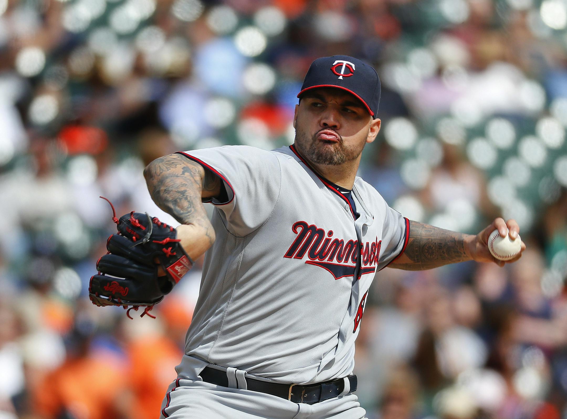 Minnesota Twins pitcher Hector Santiago throws against the Detroit Tigers in the fifth inning of a baseball game in Detroit, Thursday, Sept. 15, 2016. (AP Photo/Paul Sancya)