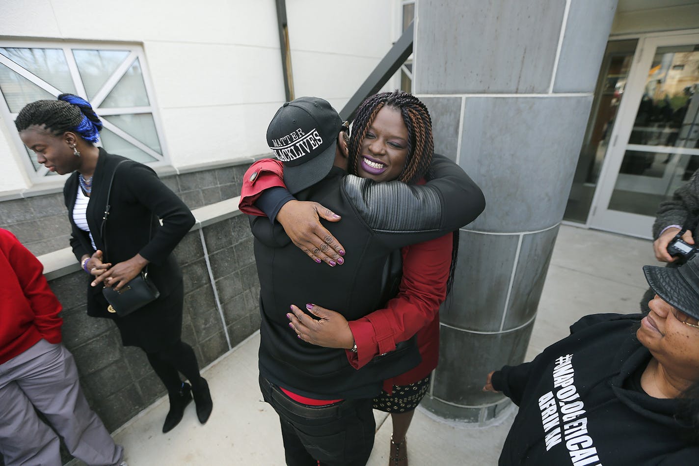 Nekima Levy-Pounds was greeted by supporters alongside her 19-year-old daughter Jayda Pounds, left, before she announced her candidacy for Minneapolis Mayor during a press conference in front of the Fourth Police Precinct, Tuesday, November 15, 2016 in Minneapolis, MN.