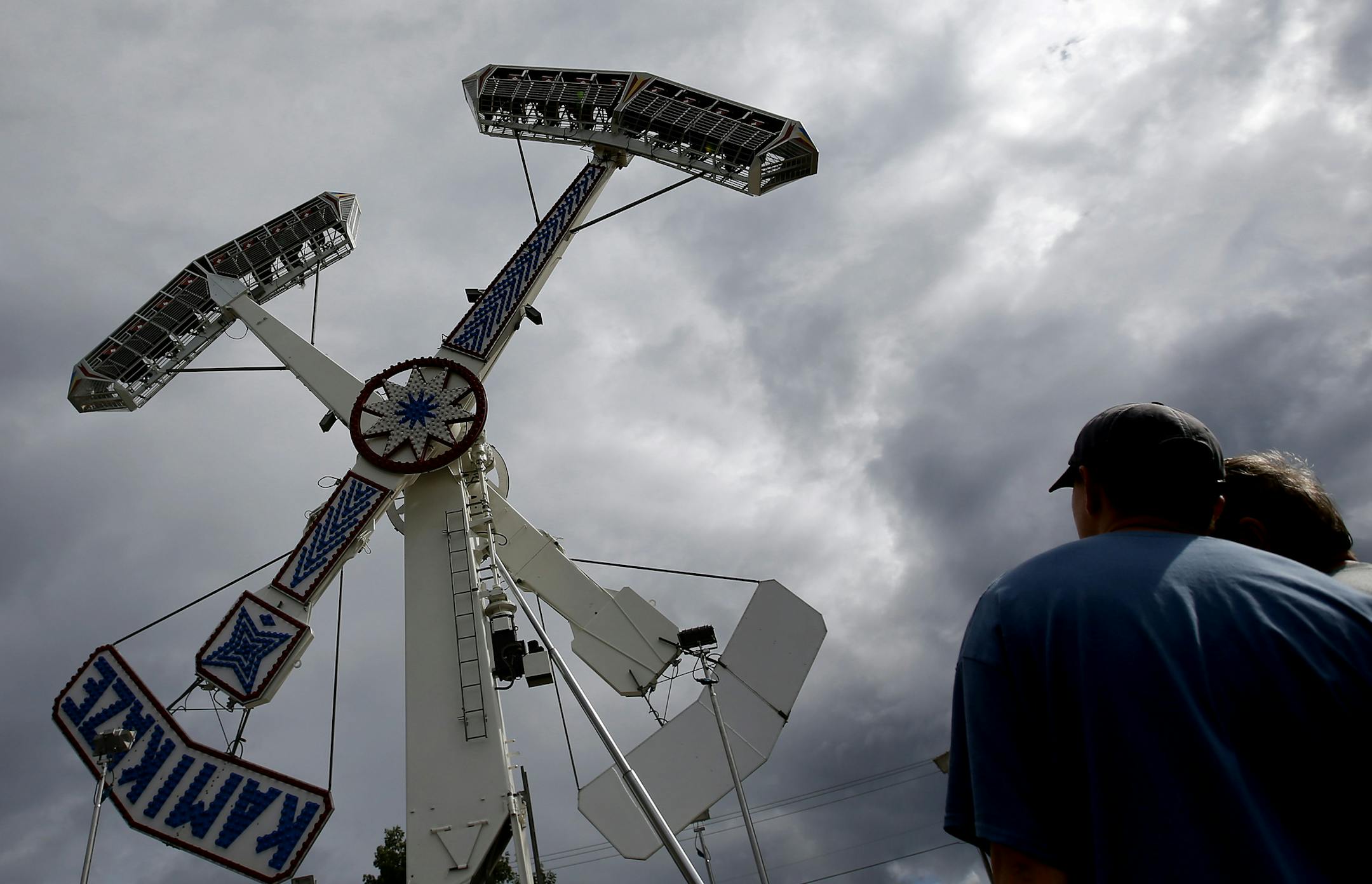 Clouds served as a backdrop for the Kamikaze ride at the fair, which wrapped up a six-day run Sunday. Other attractions included bull-riding, fireworks and live music.
