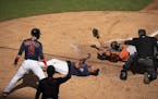 Twins second baseman Luis Arraez was tagged out at home by Astros catcher Martin Maldonado in the fifth inning. It would have been the go ahead run.