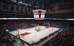Fewer fans than usual were in the stands at Williams Arena for the opening tipoff on March 12 between Hopkins and Stillwater, one of the last state to