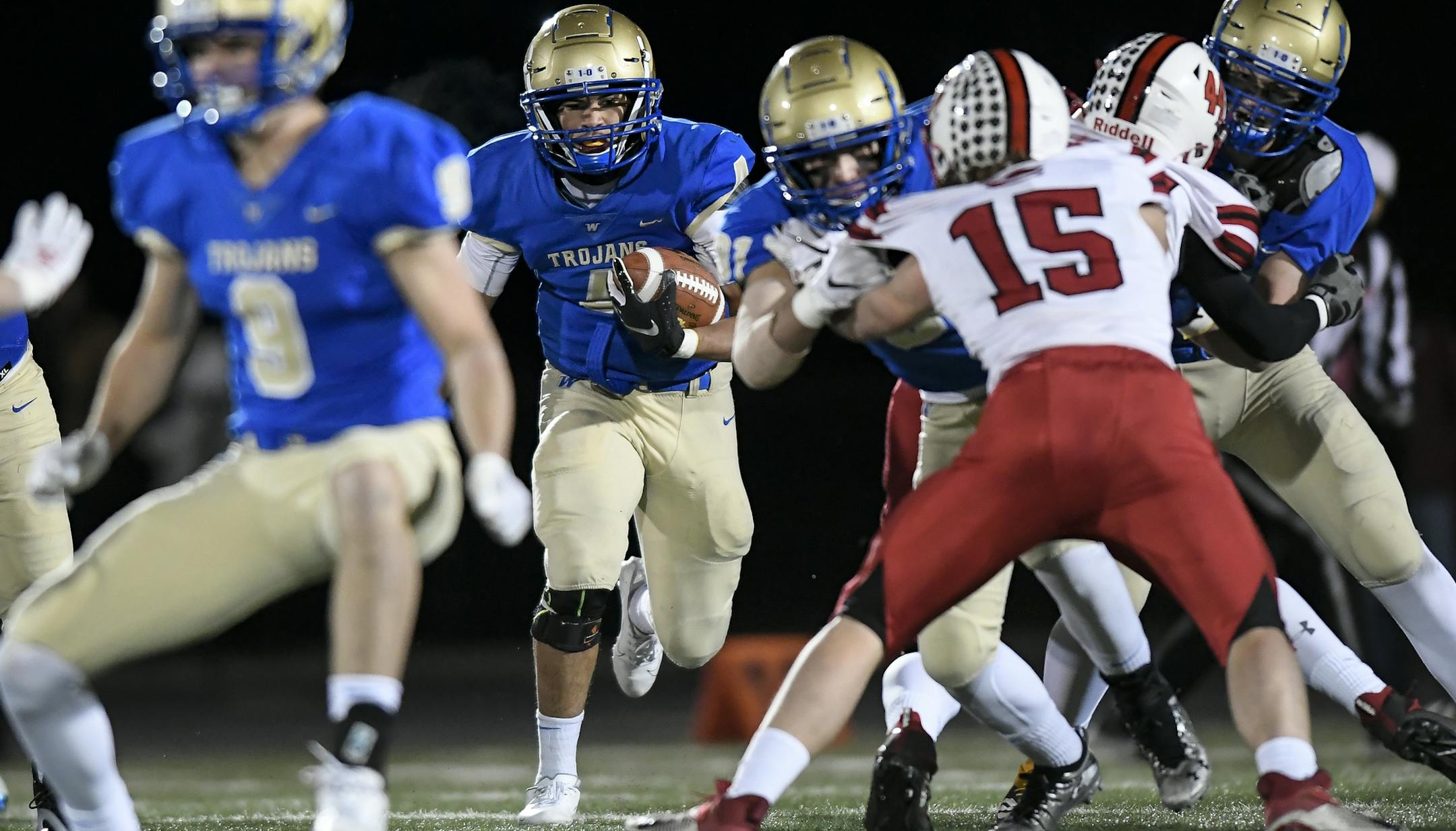 Wayzata running back Christian Vasser (4) ran the ball in the first half against Centennial. ] Aaron Lavinsky • aaron.lavinsky@startribune.com Wayzata played Centennial in a Class 6A football state quarterfinal game on Friday, Nov. 8, 2019 at Chanhassen High School in Chanhassen, Minn.