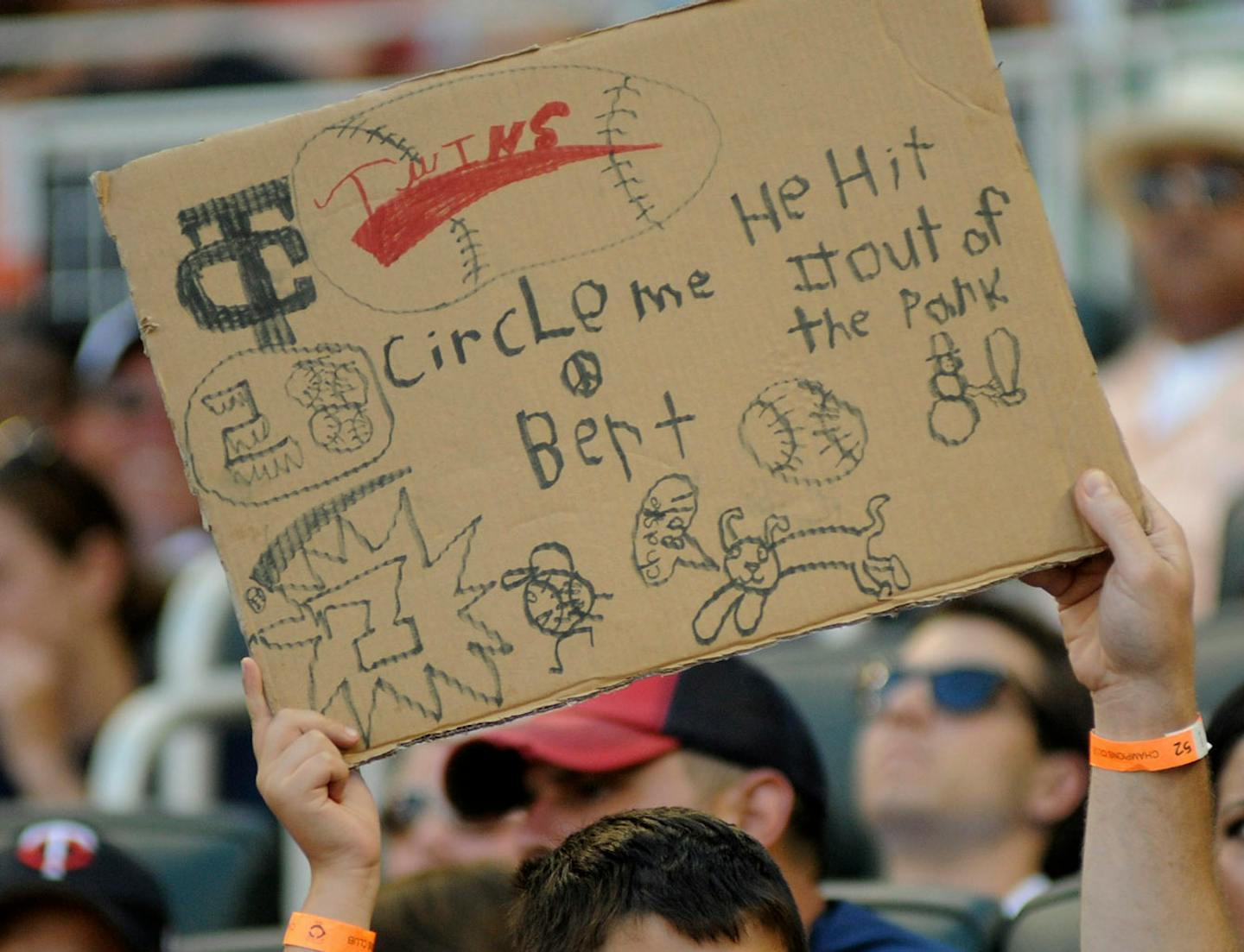 Collin Sullivan 8 years old of Roseville, Minn held up his Circle Me Bert sign at Target Field in Minneapolis Minn., Sunday, July 25, 2011. ] Richard Sennott/Star Tribune. Richard.Sennott@startribune.com Minneapolis,Minn. Sunday 07/25/11) ** ORG XMIT: MIN2013042413003664