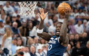 Timberwolves forward Julius Randle attempts a layup against the Warriors in the first quarter of Game 2 of an NBA Western Conference semifinal playoff