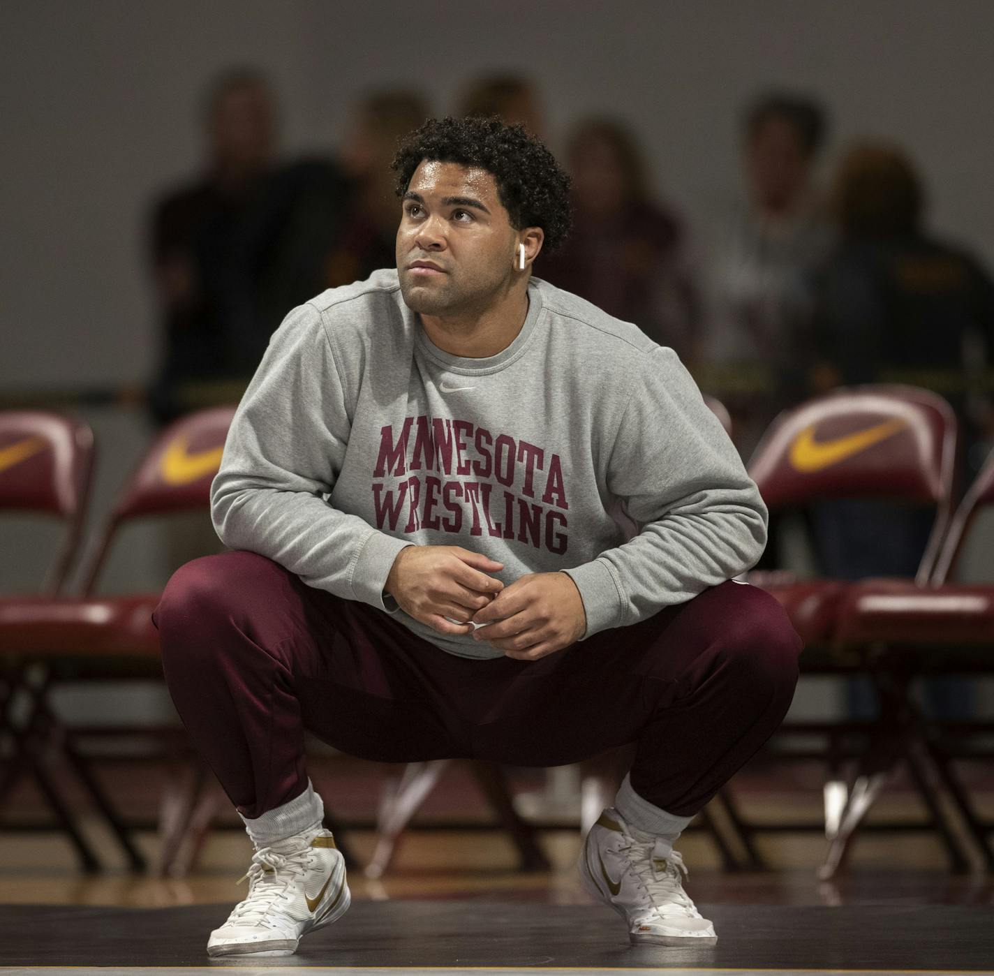 Gable Steveson warms up before wrestling in an NCAA Big Ten tournament in Minneapolis, Minn, Sunday, Jan. 6, 2019. Nationally-ranked University of Minnesota heavyweight wrestler Gable Steveson and a teammate have been arrested on suspicion of criminal sexual conduct. KSTP-TV reports that jail records show Steveson and Dylan Martinez were arrested Saturday night, June 15, 2019, at different times and places in Minneapolis. (Jerry Holt/Star Tribune via AP)