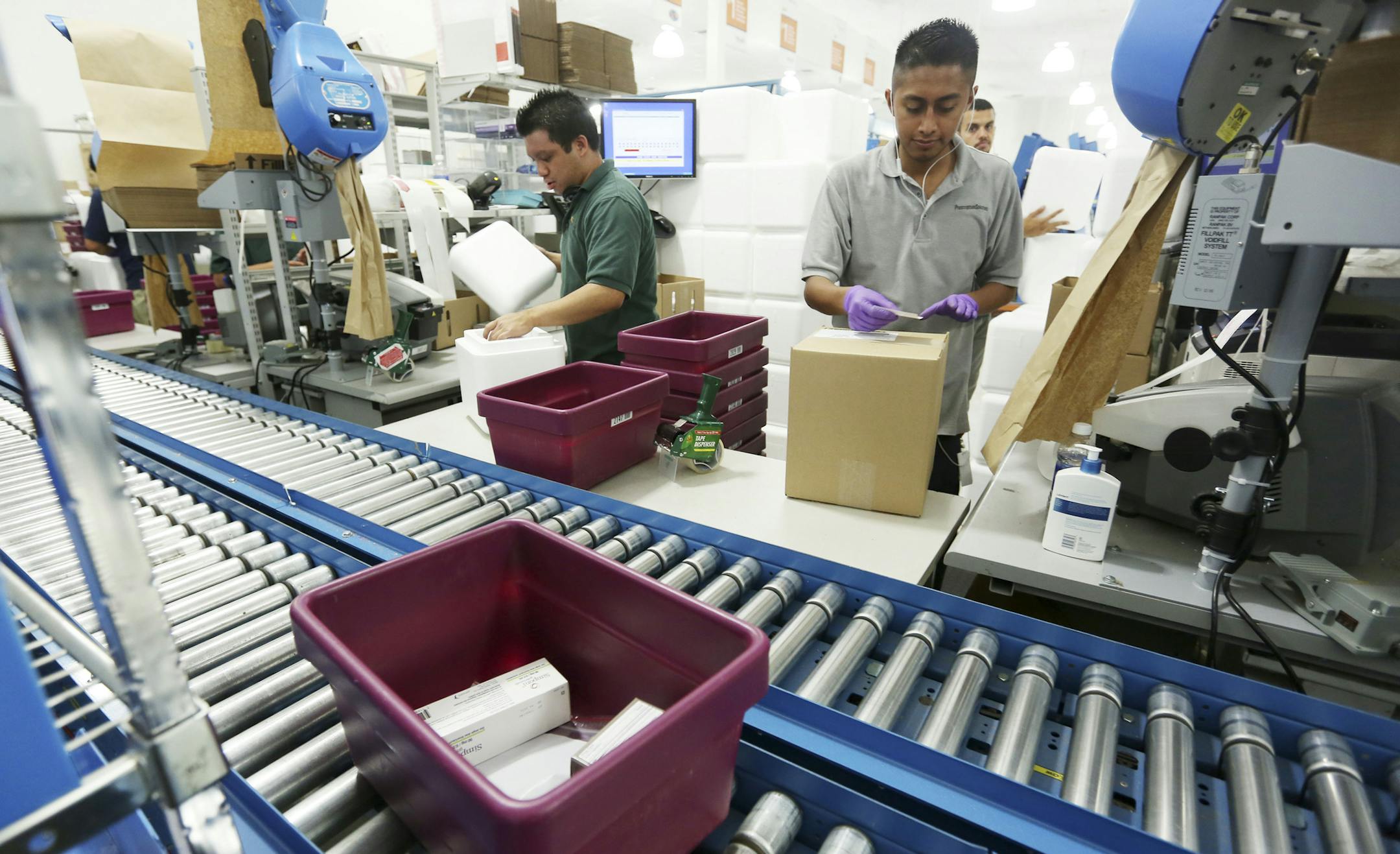 This month, workers packed drugs at Optum RX in Calsbad, Calif. A one percent drop in drug spending was partly a sign of the rising use of generics.