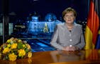 German Chancellor Angela Merkel poses for a photograph after the recording of her annual New Year's speech at the Chancellery in Berlin, Germany, Dec.