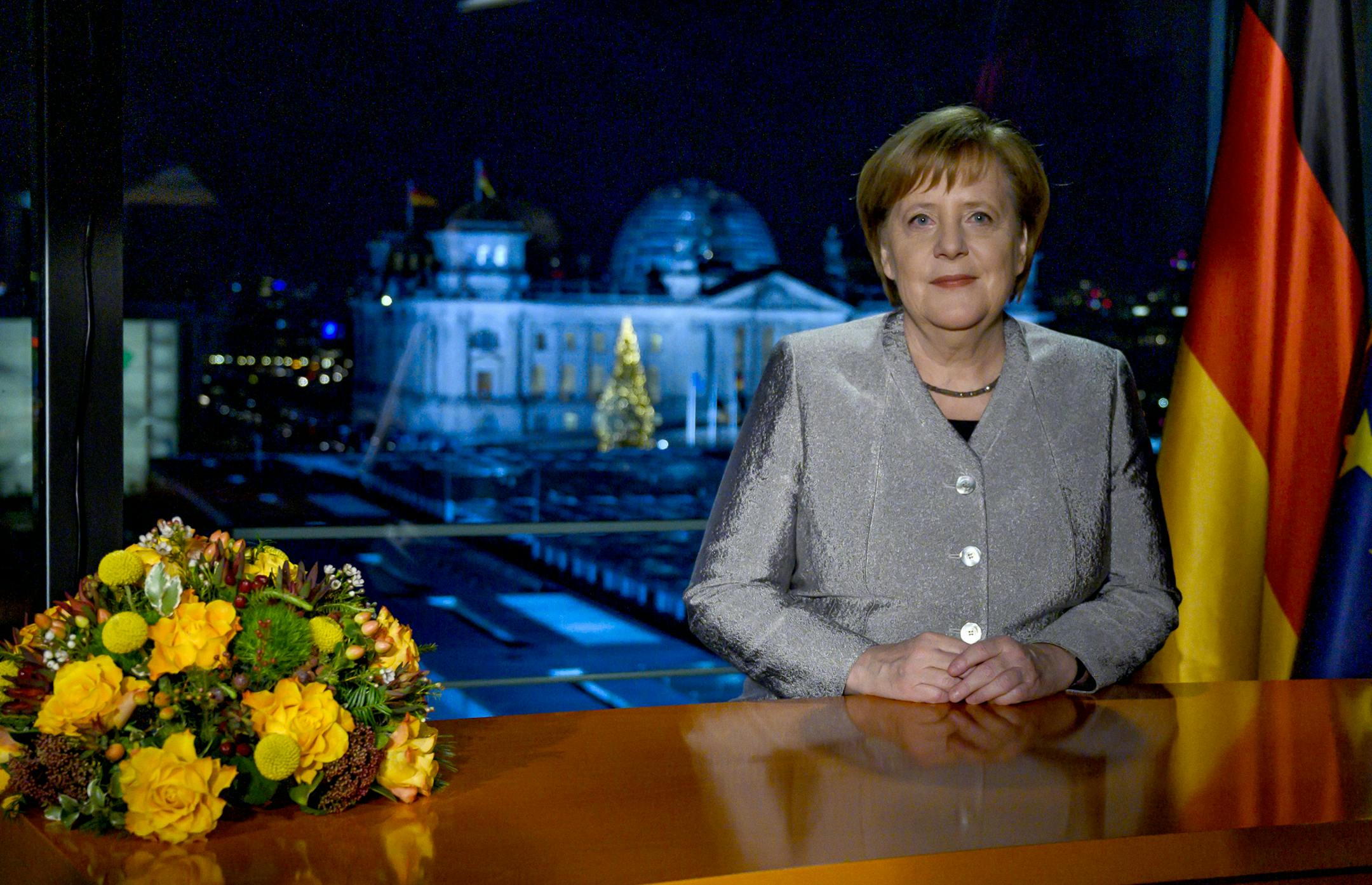 German Chancellor Angela Merkel poses for a photograph after the recording of her annual New Year's speech at the Chancellery in Berlin, Germany, Dec. 30, 2018. (John MacDougall/pool photo via AP)