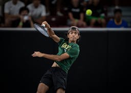 Rochester Mayo's Tej Bhagra, shown in Wednesday's team competition, reached the semifinals in singles Thursday.