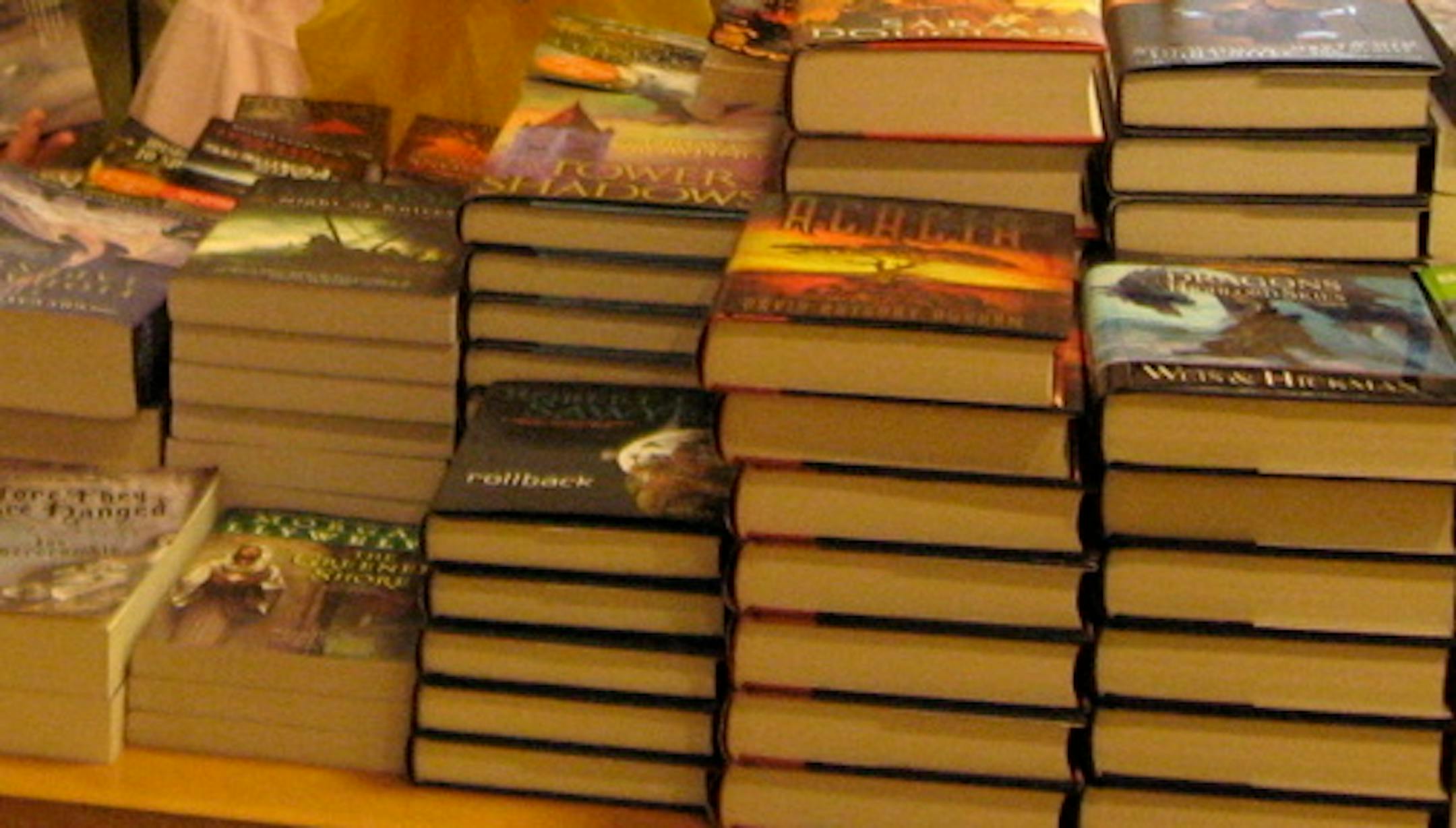Books stacked up at a bookstore in Montreal.