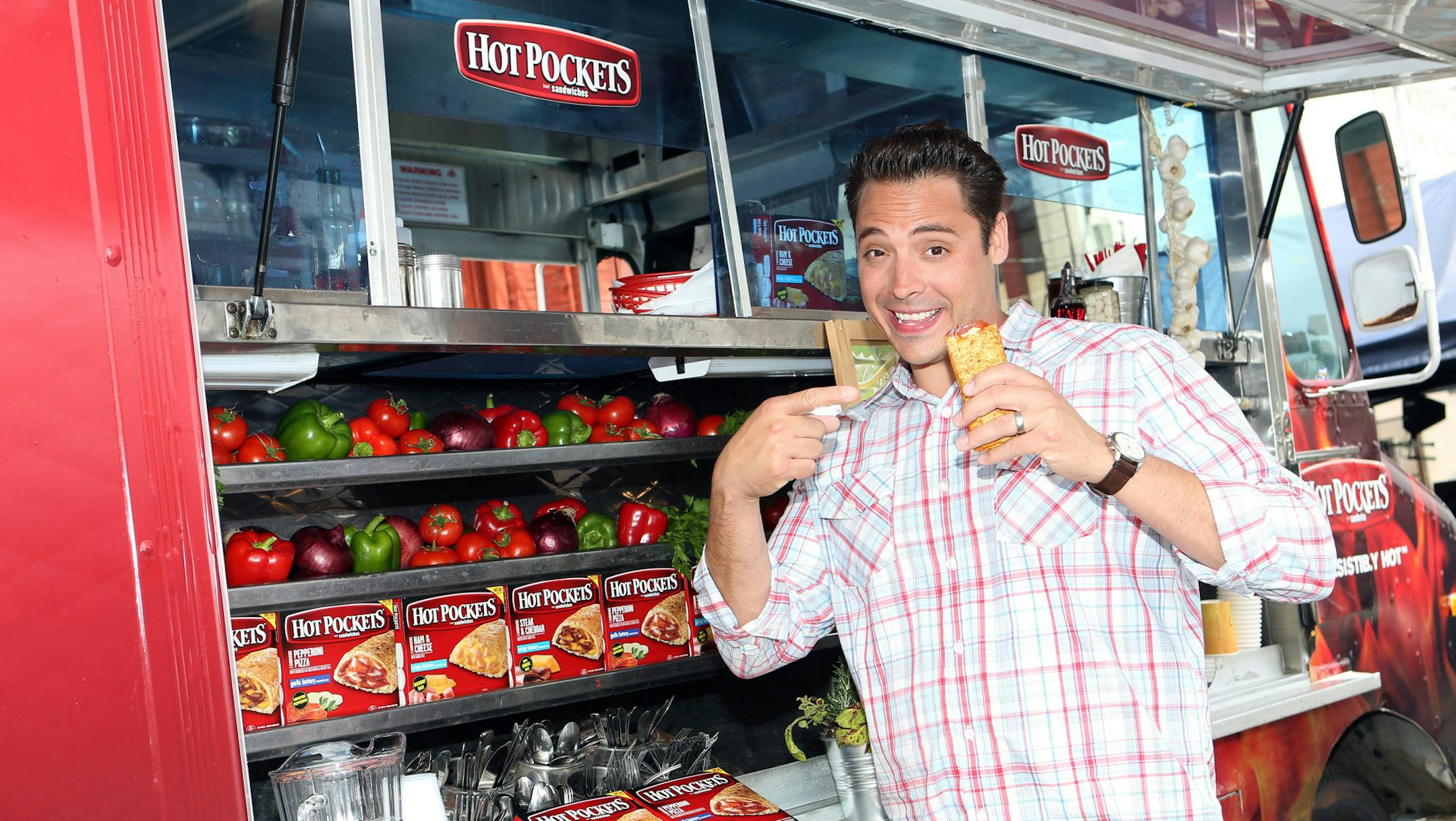 IMAGE DISTRIBUTED FOR NESTLE PREPARED FOODS/HOT POCKETS - In this photo released by NestlÈ Prepared Foods/Hot Pockets on July 16, 2013 - Food Network's "Sandwich King" Jeff Mauro is seen on location with the new Hot Pockets brand sandwiches in Los Angeles. (Photo by Casey Rodgers/Invision for NestlÈ Prepared Foods/Hot Pockets/AP Images)
