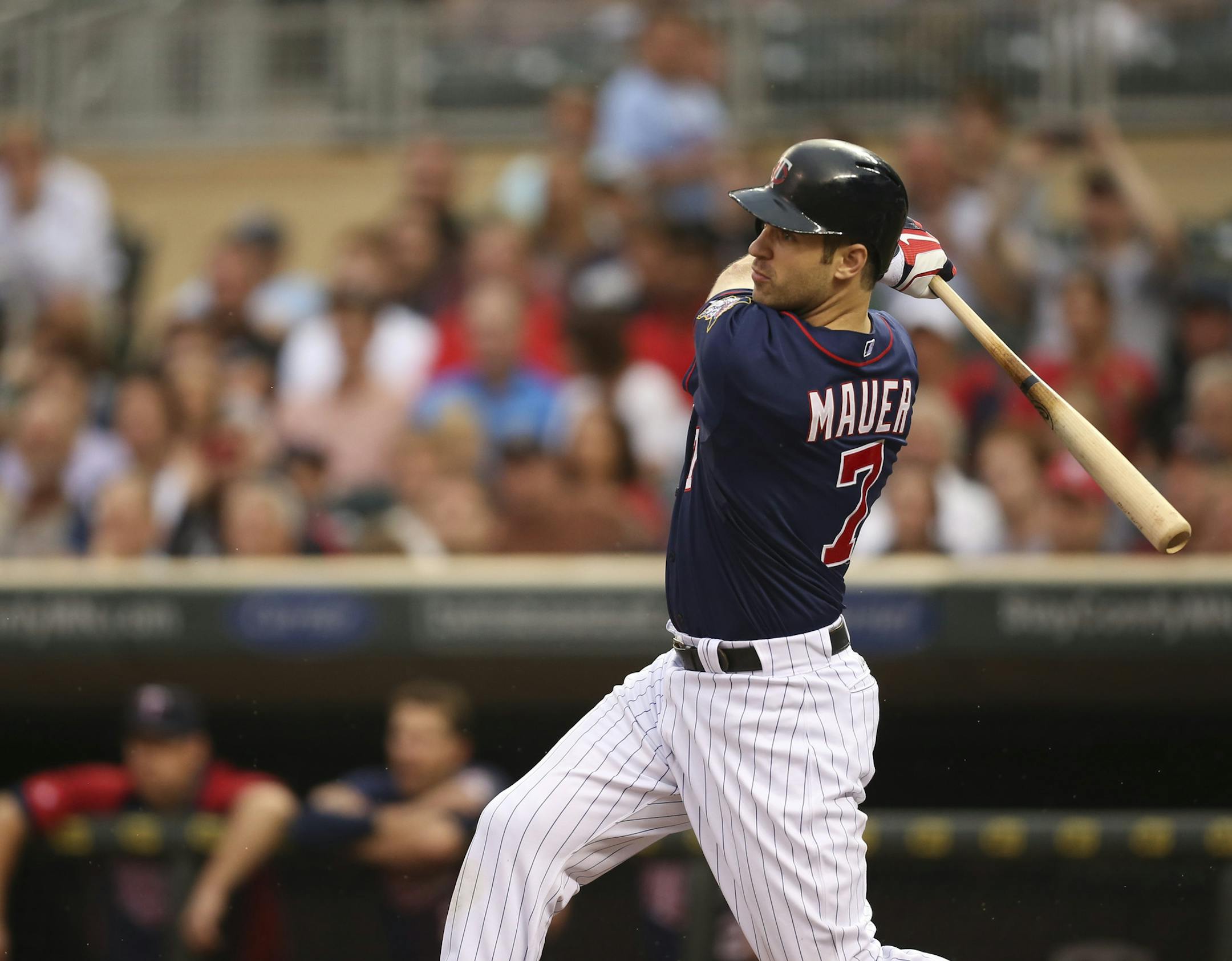 True to form, Joe Mauer hit a first-inning RBI single to left field in his first at-bat since becoming a father last week. Mauer’s twin daughters are still in the hospital.
