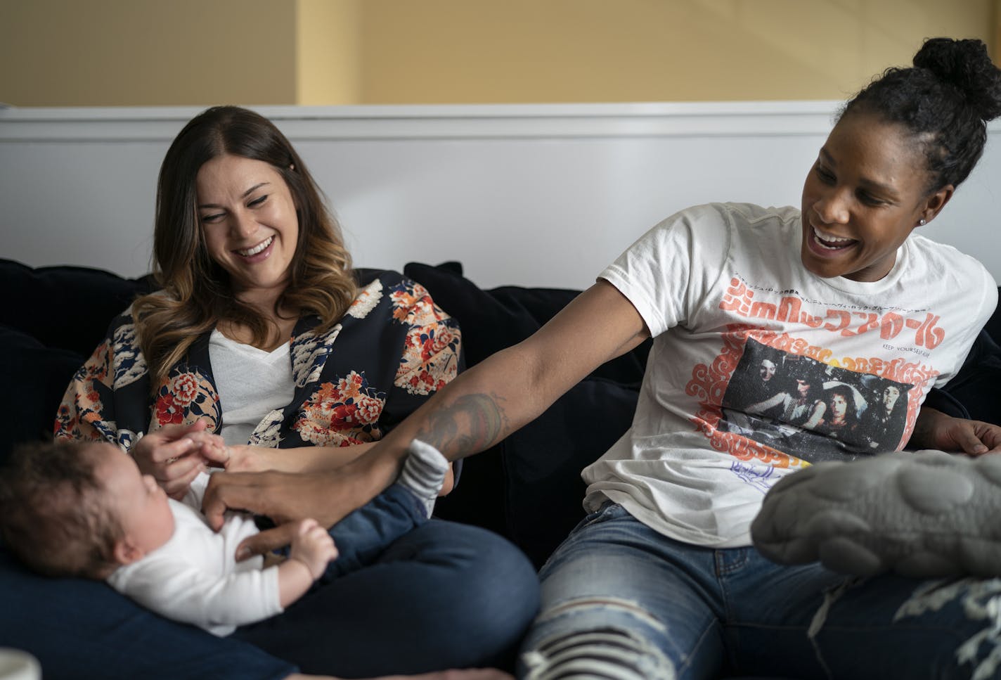 Lynx forward Rebekkah Brunson, right, and her wife, Bobbi Jo Lamar Brunson, enjoy spending time with their nearly 4-month-old son, Graham, at home in Minnetonka.