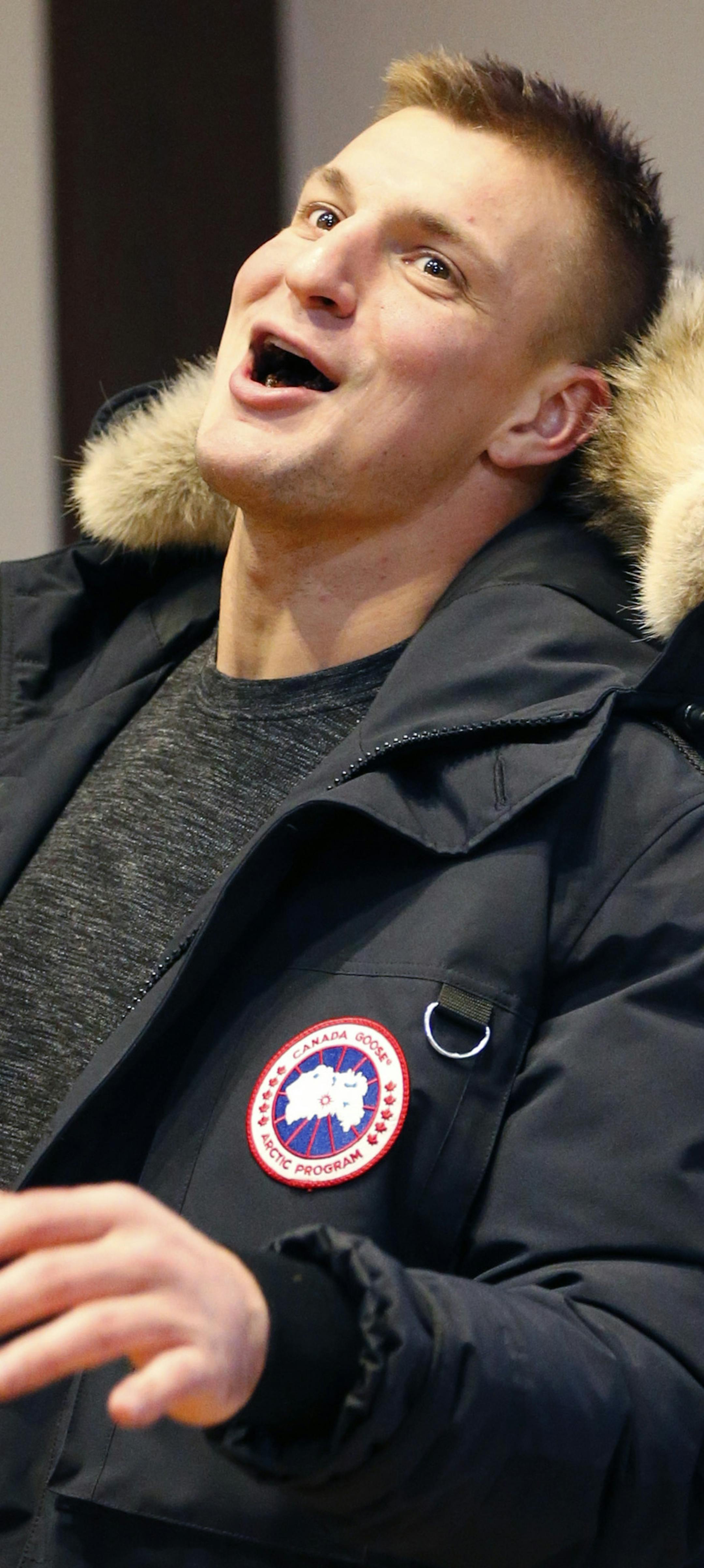 New England Patriots tight end Rob Gronkowski laughs as he arrives to the media following an NFL divisional playoff football game against the Tennessee Titans, Saturday, Jan. 14, 2018, in Foxborough, Mass. (AP Photo/Michael Dwyer) ORG XMIT: NYOTK