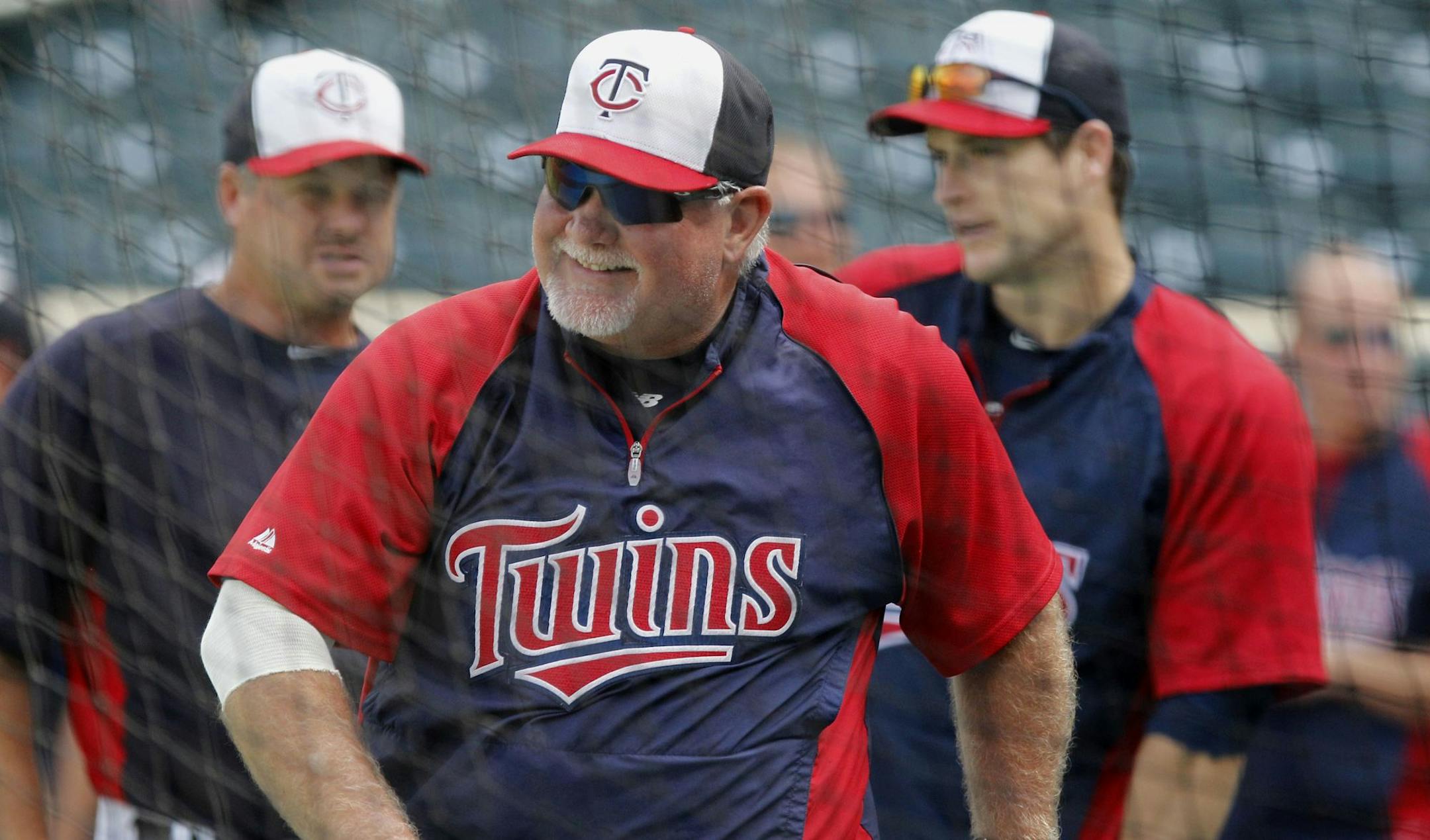 Minnesota Twins manager Ron Gardenhire (35) shown during warmups before a baseball game between the Detroit Tigers and the Minnesota Twins, Friday, June 14, 2013, in Minneapolis. (AP Photo/Genevieve Ross) ORG XMIT: MIN2013071818265114