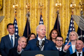 President Joe Biden, with Congressional and border community members behind him, hosts a 12-year-anniversary event for Deferred Action for Childhood A