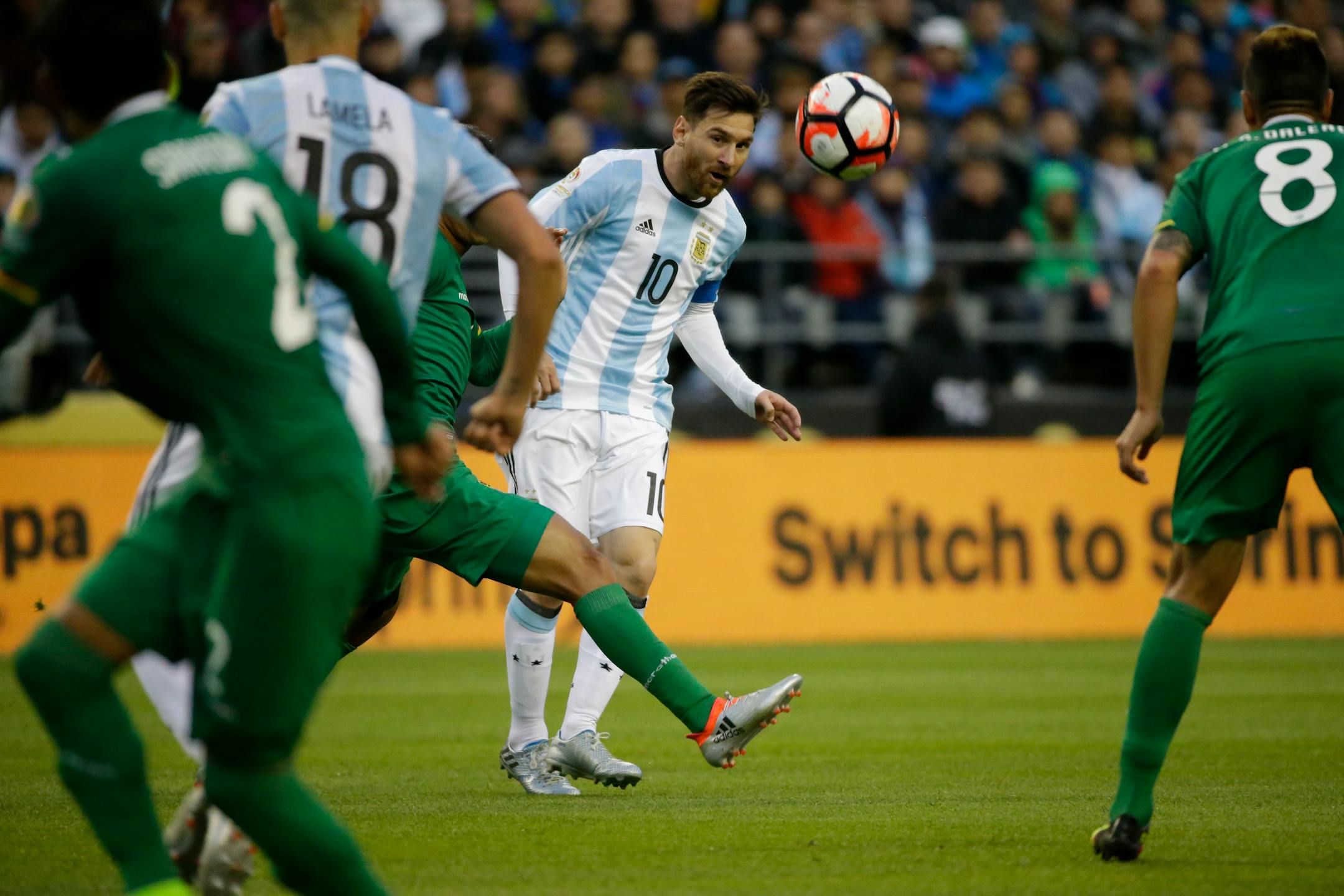 Argentina's Lionel Messi, center, kicks the ball during a Copa America Centenario Group D soccer match against Bolivia, Tuesday, June 14, 2016, in Seattle. Argentina won 3-0. (AP Photo/Ted S. Warren)