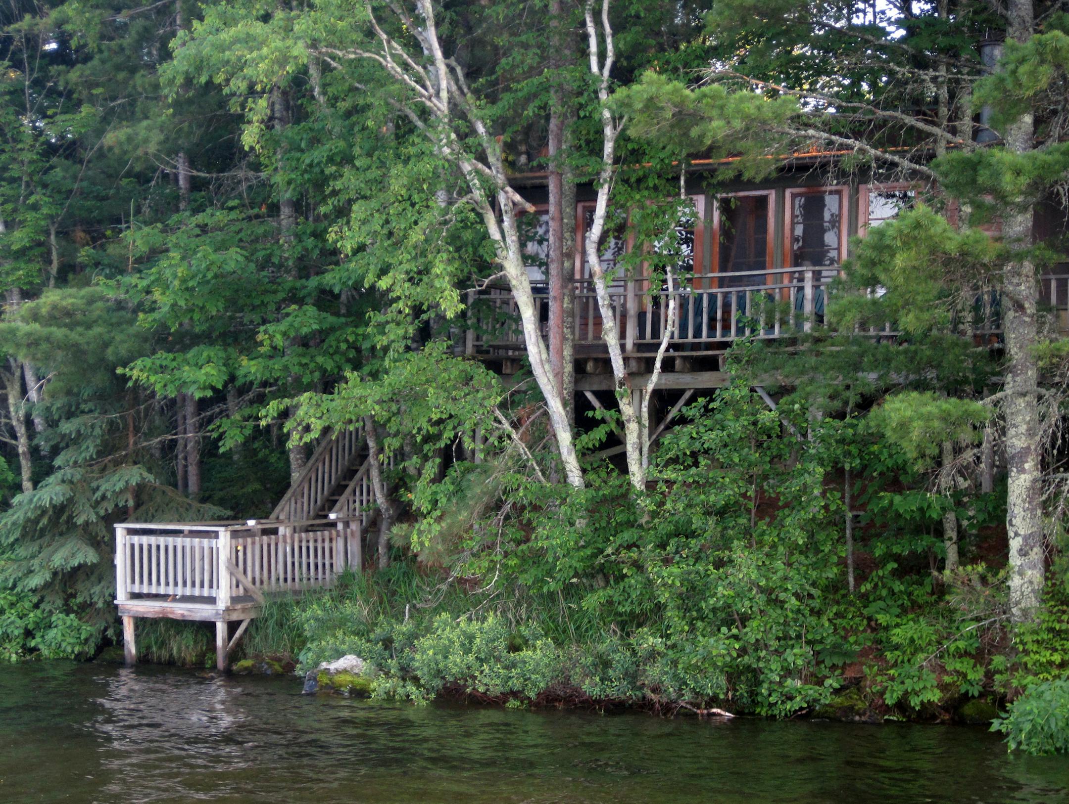 Each of the cabins at Ludlow's Island Resort is unique. This one, Dawn, was built in 1955 using a series of doors to create a wall of windows looking onto the lake. ] Photo by KERRI WESTENBERG