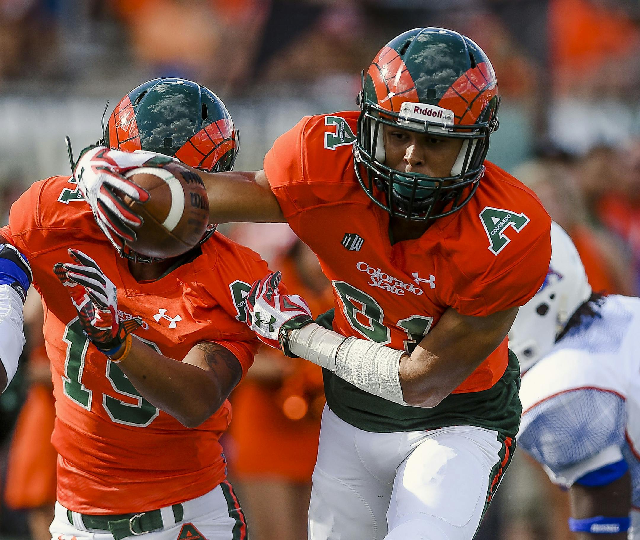 Colorado State's Olabisi Johnson, (81) dives into the end zone for a touchdown against Savannah State during an NCAA college football game, Saturday, Sept. 5, 2015, at Hughes Stadium in Fort Collins, Colo. (Erin Hull/The Coloradoan via AP) MANDATORY CREDIT
