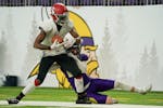 Coon Rapids wide receiver Avont Shannon (3) was brought down out of bounds by Chaska defensive back Michael Brown (22) in the second half.