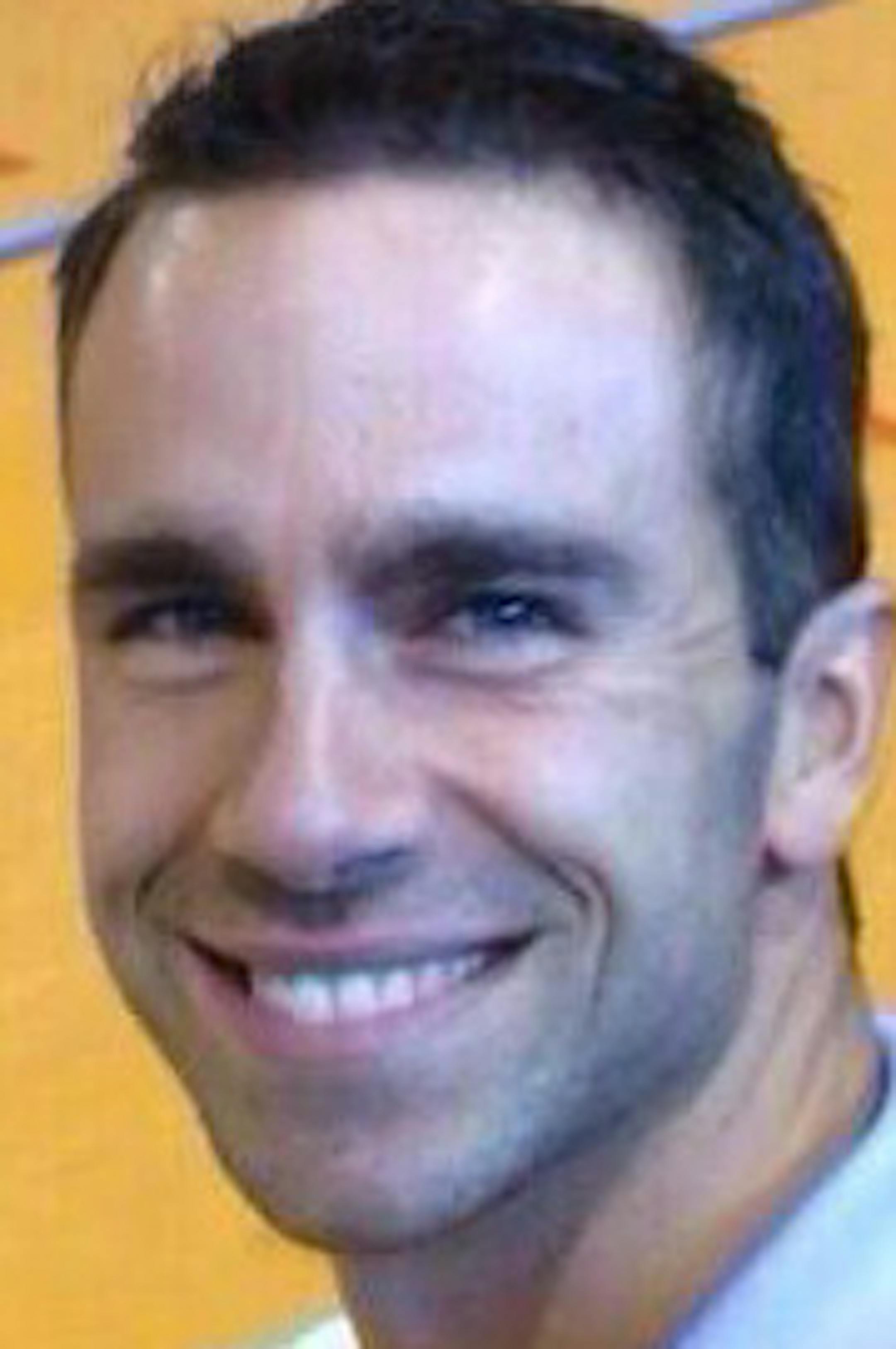 This undated photo provided by Omaima ElFaitori shows Ronald Thomas Smith II. Smith, an American chemistry teacher, was shot to death as he was jogging in Benghazi on Thursday, Dec. 5, 2013. (AP Photo/Omaima ElFaitori)