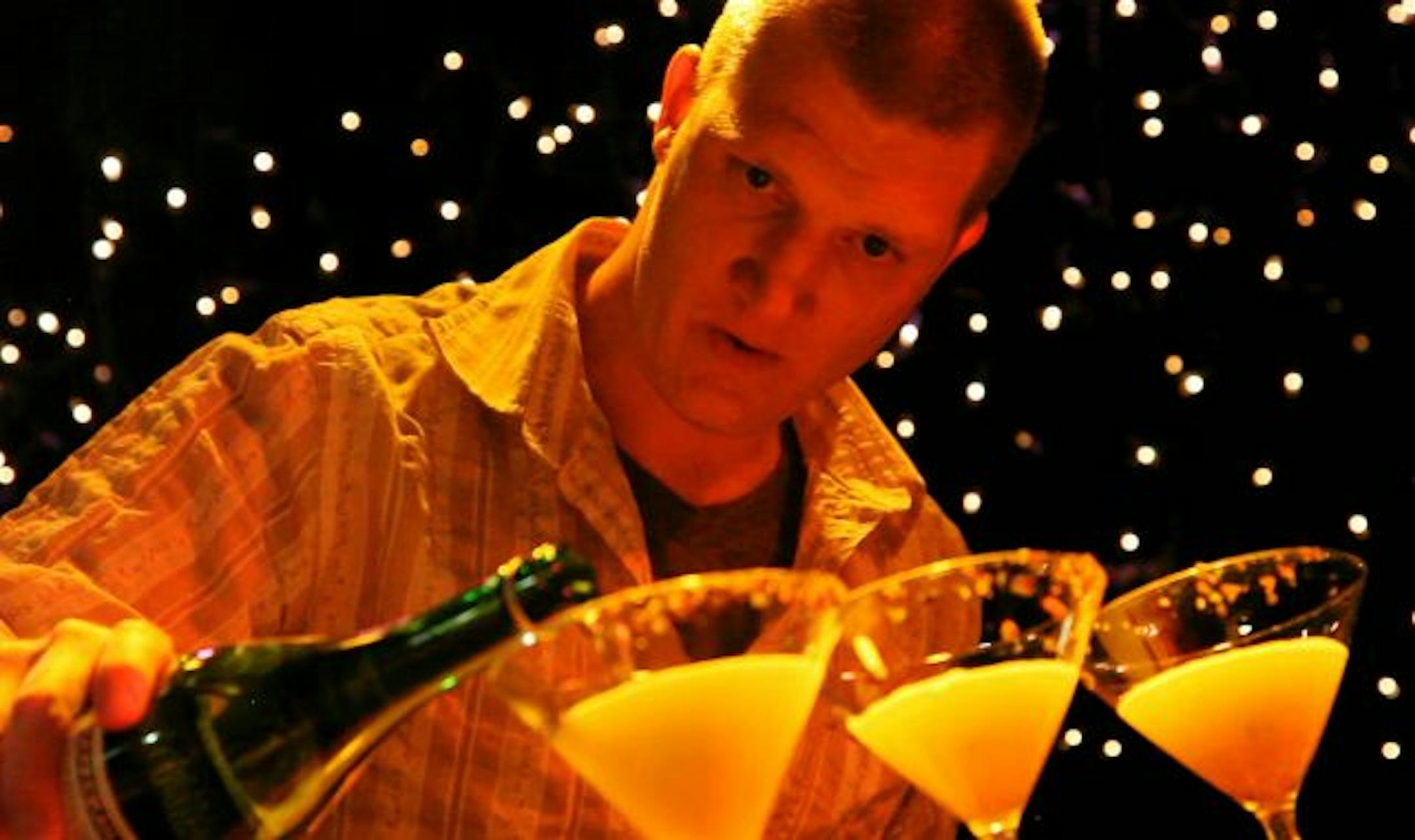 Jeff Rogers of Elixir finished off the cocktails as he competed with partner Chad Larson in the Iron Bartender 2 competition using the secret ingredient lemons at Hell's Kitchen Sunday night. The two won the round.