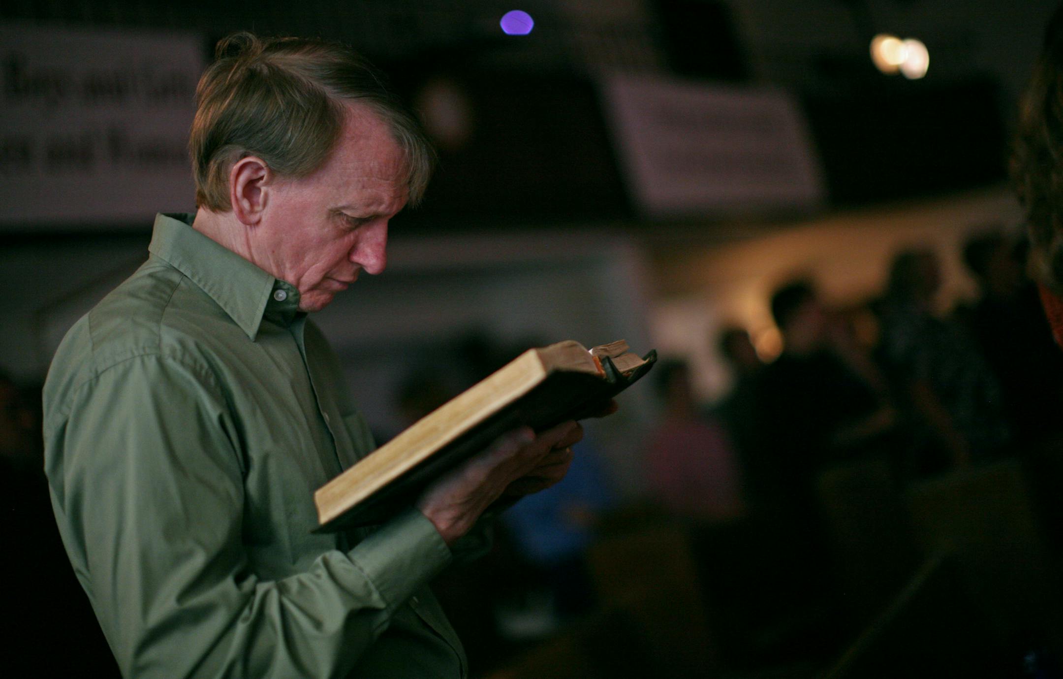 Michael Johnson of Albert Lea followed along in his Bible as Pastor George Marin preached last Sunday morning at Grace Christian Church.