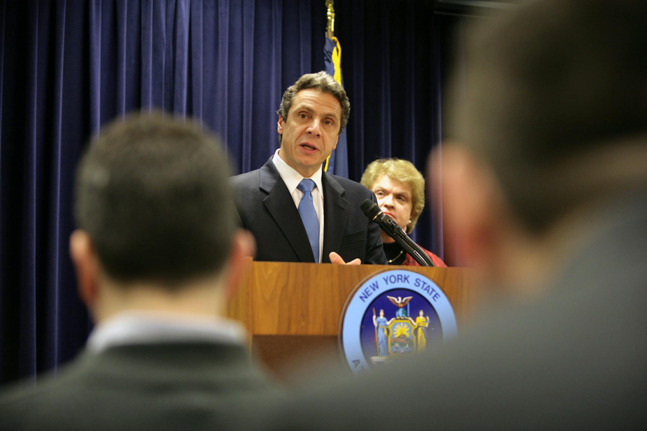 New York Attorney General Andrew Cuomo announced on Wednesday that he intends to sue UnitedHealth Group and that he is investigating whether major health insurance firms conspired to overcharge patients.