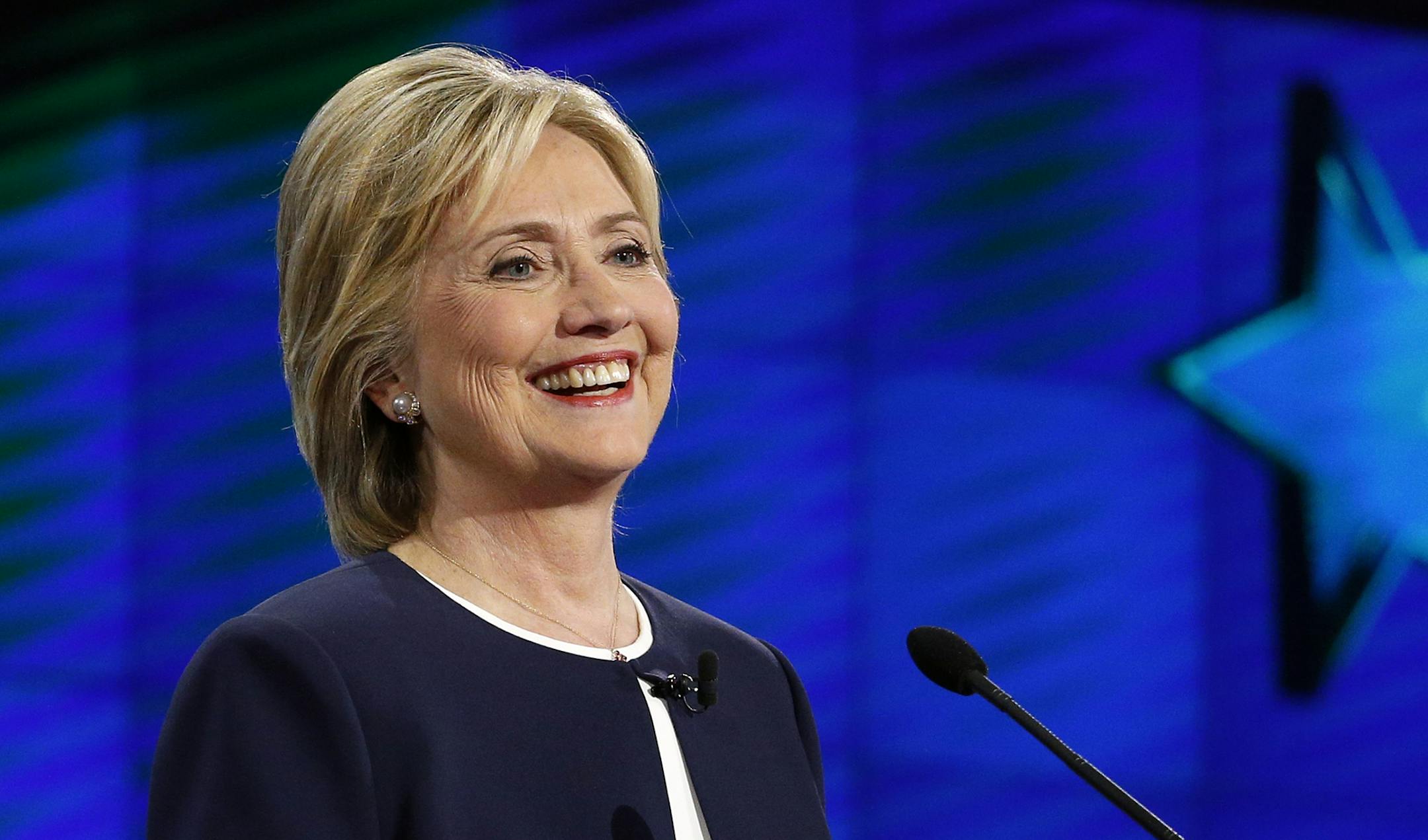 Hillary Rodham Clinton smiles during the CNN Democratic presidential debate Tuesday, Oct. 13, 2015, in Las Vegas. (AP Photo/John Locher) ORG XMIT: MIN2015101322291763