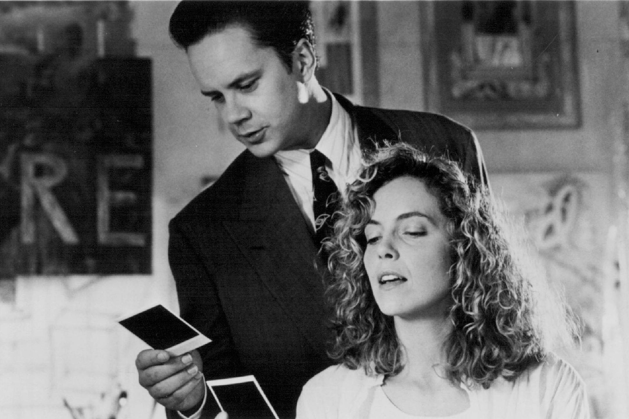 April 26, 1992 Susan Avery (Whoopi Goldberg), a straight-talking police detective, questions Griffin Mill (Tim Robbins) in The Player, directed by Robert Altman. A Fine Line Features release. Griffin Mill (Tim Robbins) and June Gudmunsdottir (Greta Scacchi) look a Polaroid photographs in The Player,directed by Robert Altman. A Fine Line Features release. Lorey Sabastain