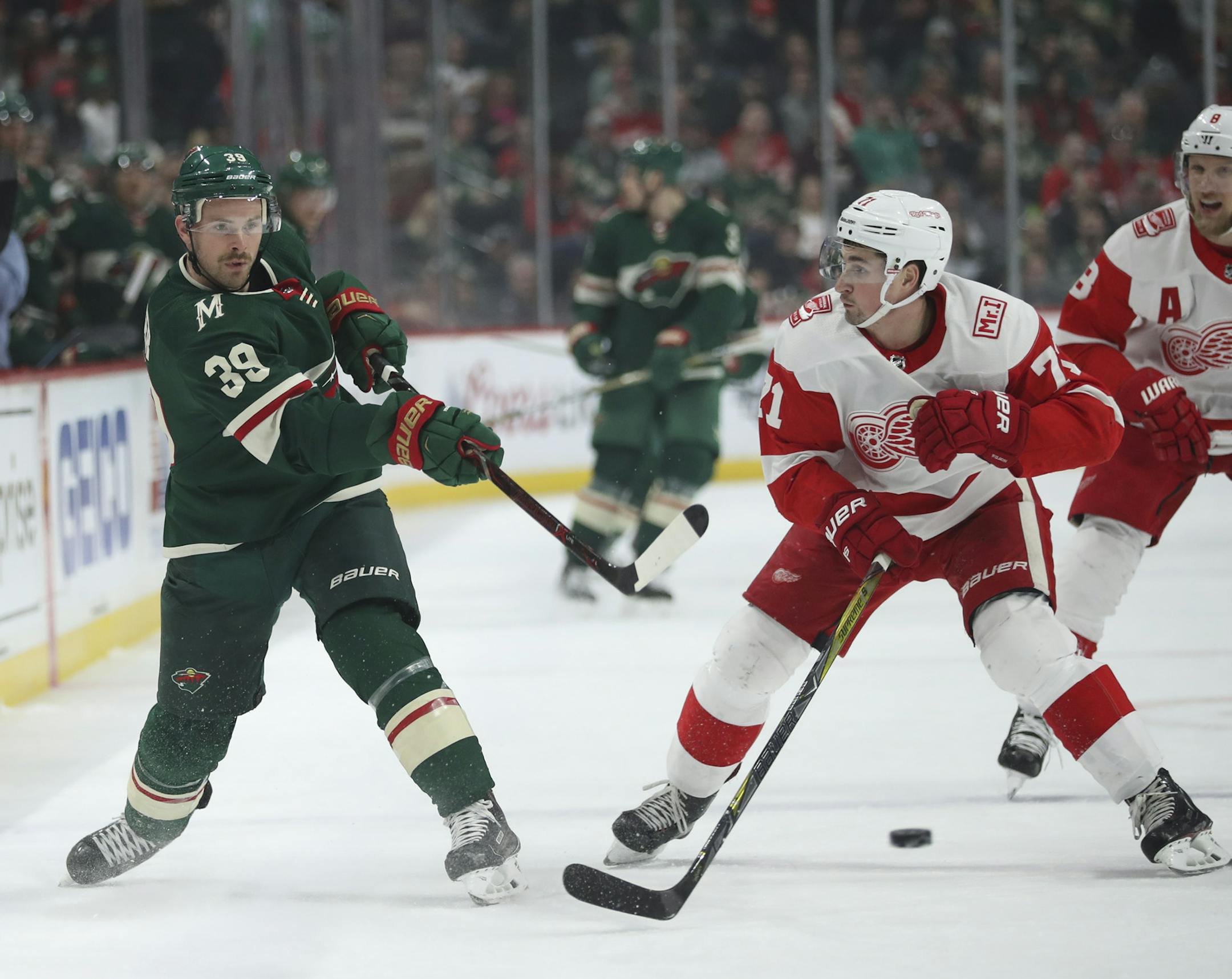 Minnesota Wild defenseman Nate Prosser (39) got a shot off from the blue line in the first period while defended by Detroit Red Wings center Dylan Larkin (71). ] JEFF WHEELER &#xef; jeff.wheeler@startribune.com The Minnesota Wild faced the Detroit Red Wings in an NHL hockey game Sunday night, March 4, 2018 at Xcel Energy Center in St. Paul.