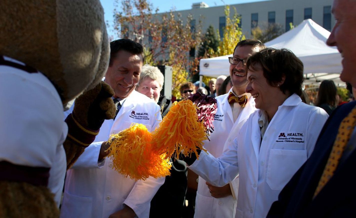 From left Drs. Daniel Landers, Joseph Neglia and Bobbi Daniels Co president of University of Minnesota Children's Hospital, cheered with Goldy Gopher during the renaming ceremony of the University of Minnesota's Children's hospital.