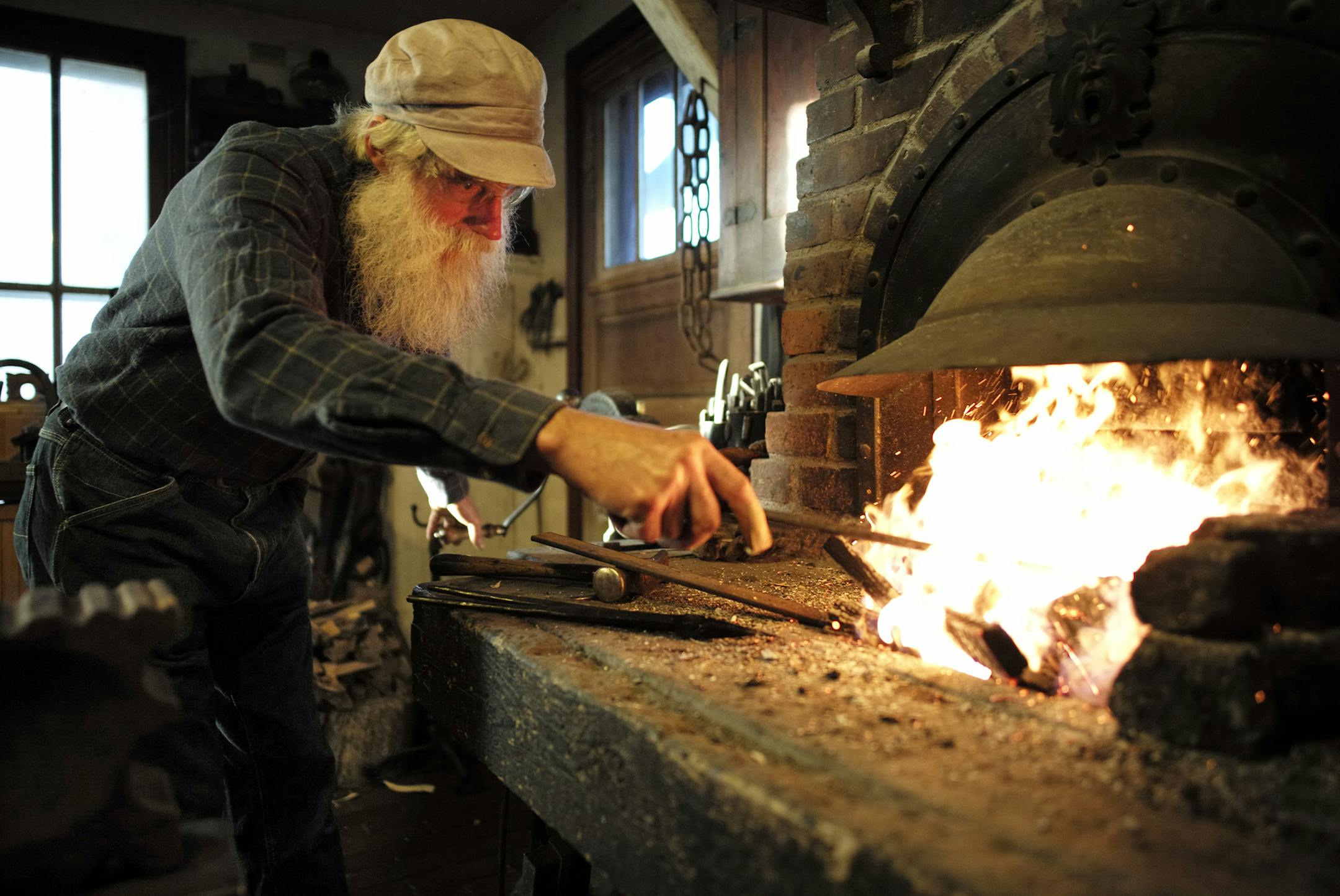 In Pepin, Wisconsin, Tom Latane is a self-taught master blacksmith who taught himself the craft. Today he was working on a key for a heirloom chest box that was missing its key.]richard tsong-taatarii/rtsong-taataarii@startribune.com