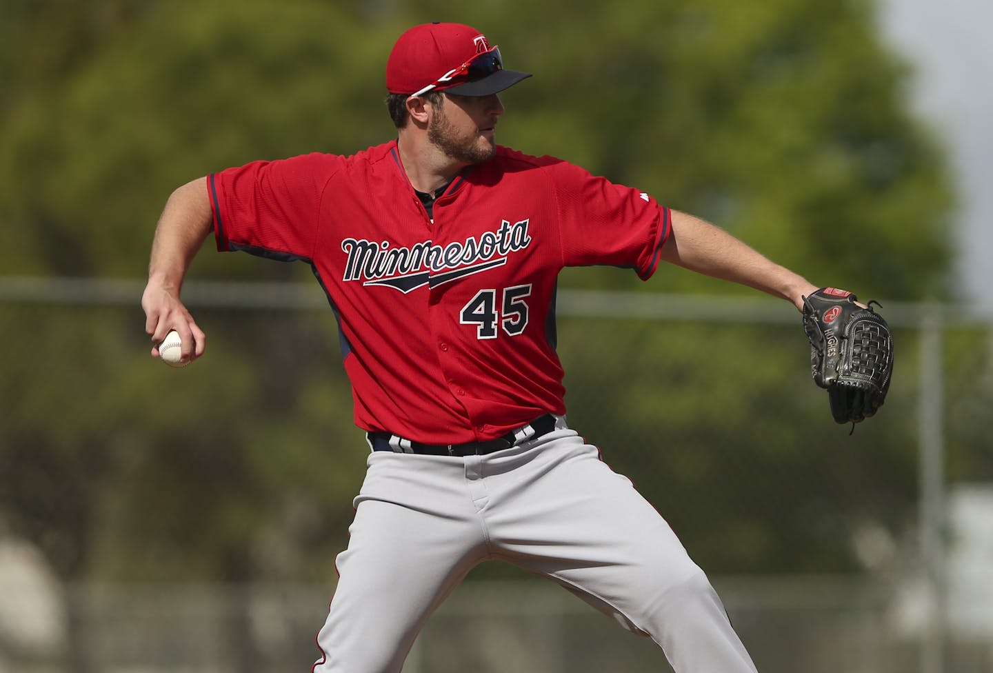 Phil Hughes was named the likely opening day starter after the first workout Monday morning at Hammond Stadium. He performed in a drill throwing to second base. ] JEFF WHEELER &#xef; jeff.wheeler@startribune.com The Paul Molitor era began when Twins pitchers and catchers held their first workout under his leadership Monday morning, February 23, 2105 at Hammond Stadium in Fort Myers, FL.