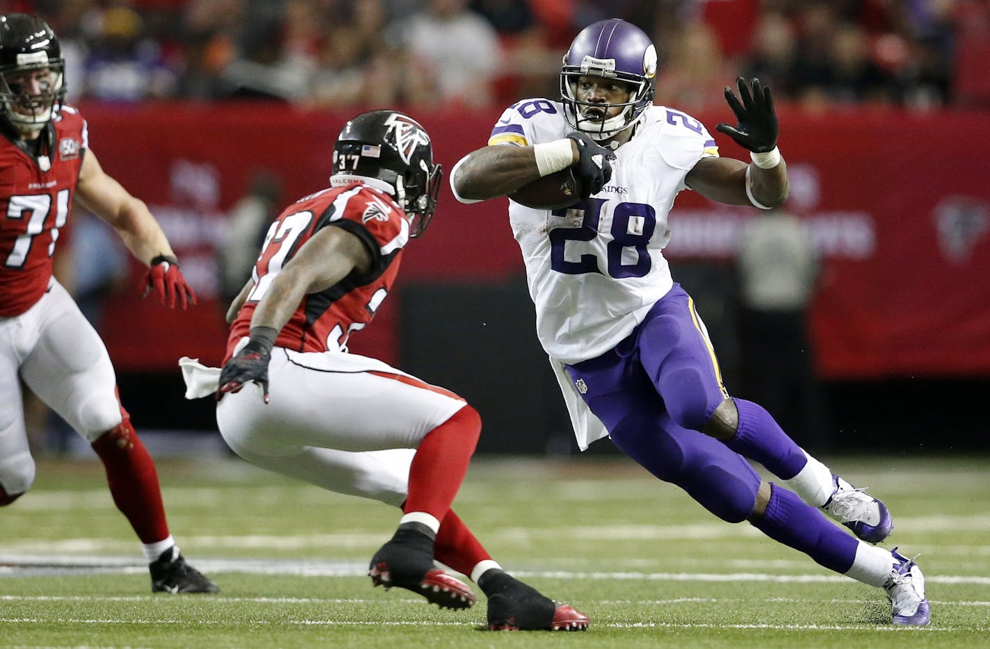 Minnesota Vikings running back Adrian Peterson (28) during a run in the third quarter.