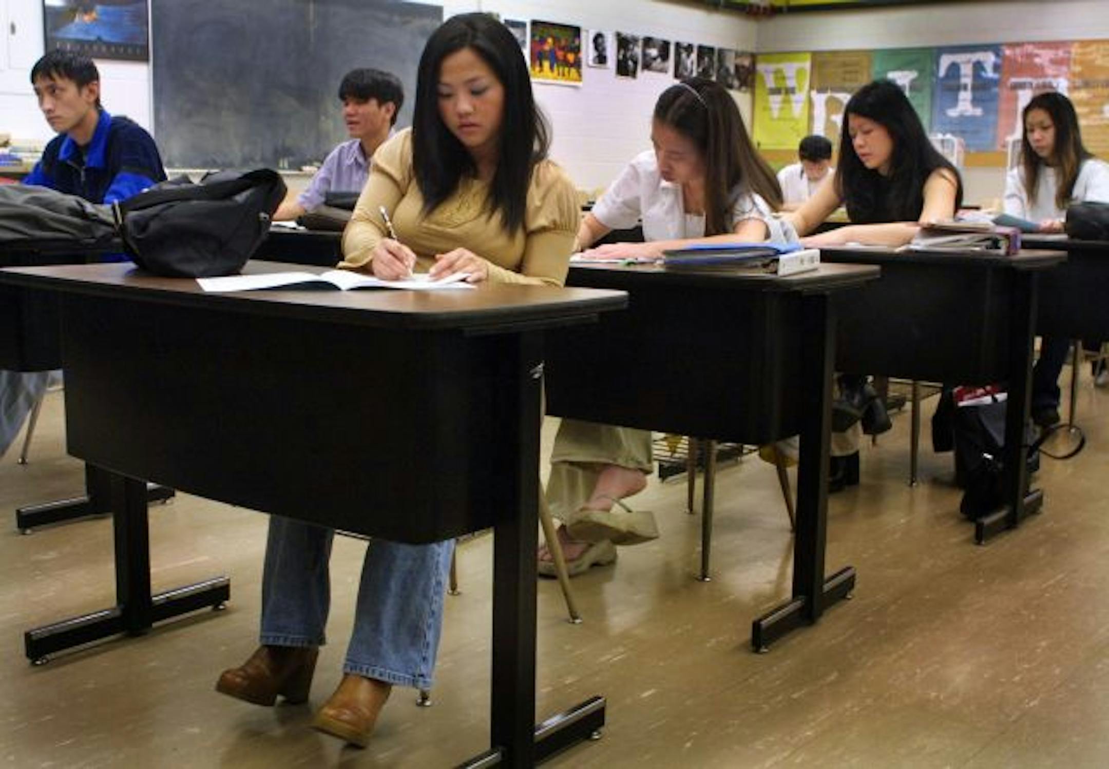 St. Paul 1/23/02 Johnson High school students prepare for state test.------Phoua Cha (front of row), a senior at Johnson High school in St. Paul, prepares for Minnesota comprehensive assessments and basic skills test along with classmates. Students will begin testing on Tuesday.
