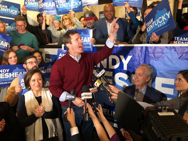 Democrat Andy Beshear speaks to supporters after a daylong tour of Kentucky on the last night of the campaign for governor, in Louisville, Ky., Monday
