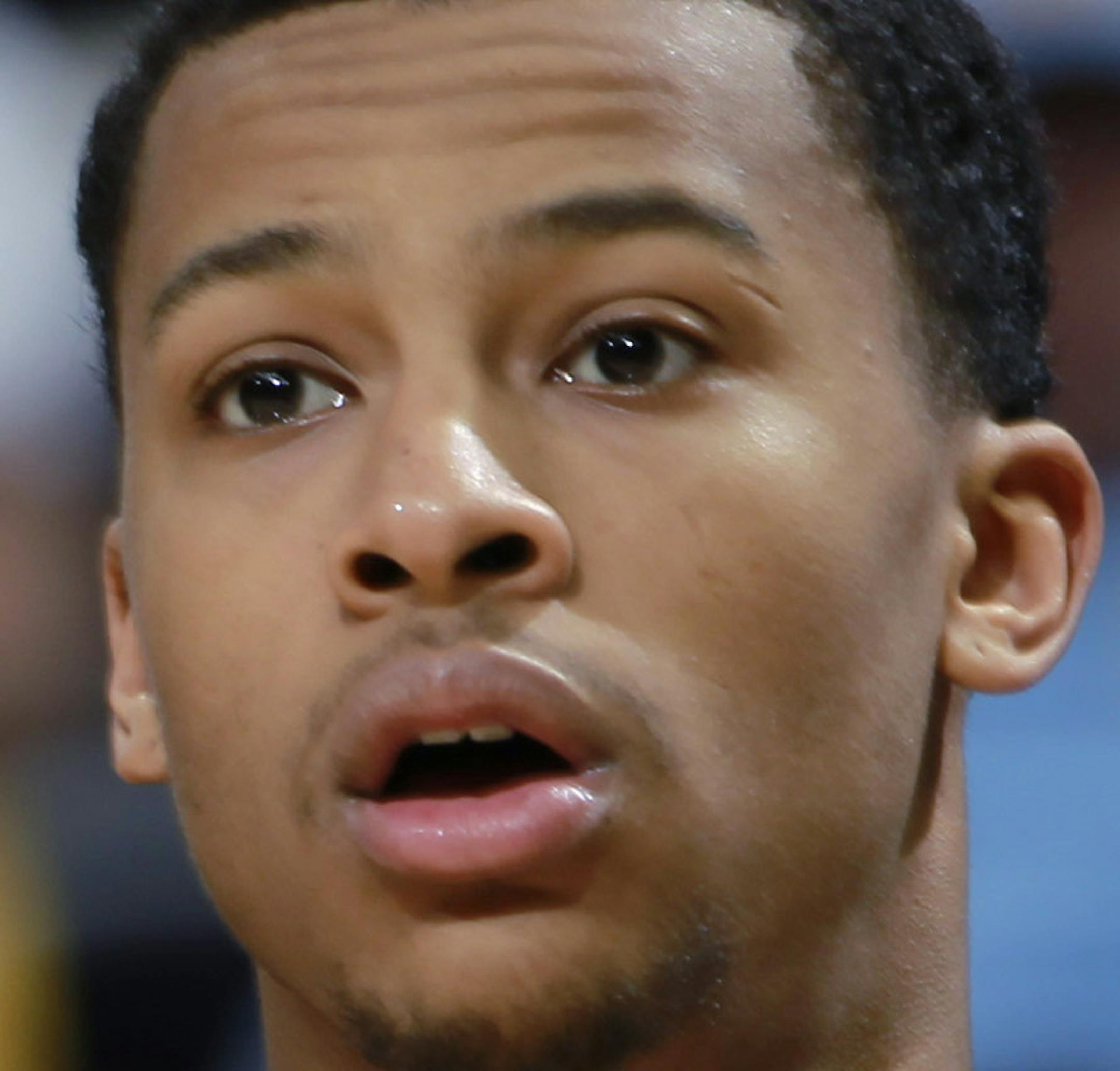 Utah Jazz guard Trey Burke takes court against the Denver Nuggets in the third quarter of Utah's 103-93 victory in an NBA basketball game in Denver on Friday, Dec. 13, 2013. (AP Photo/David Zalubowski)