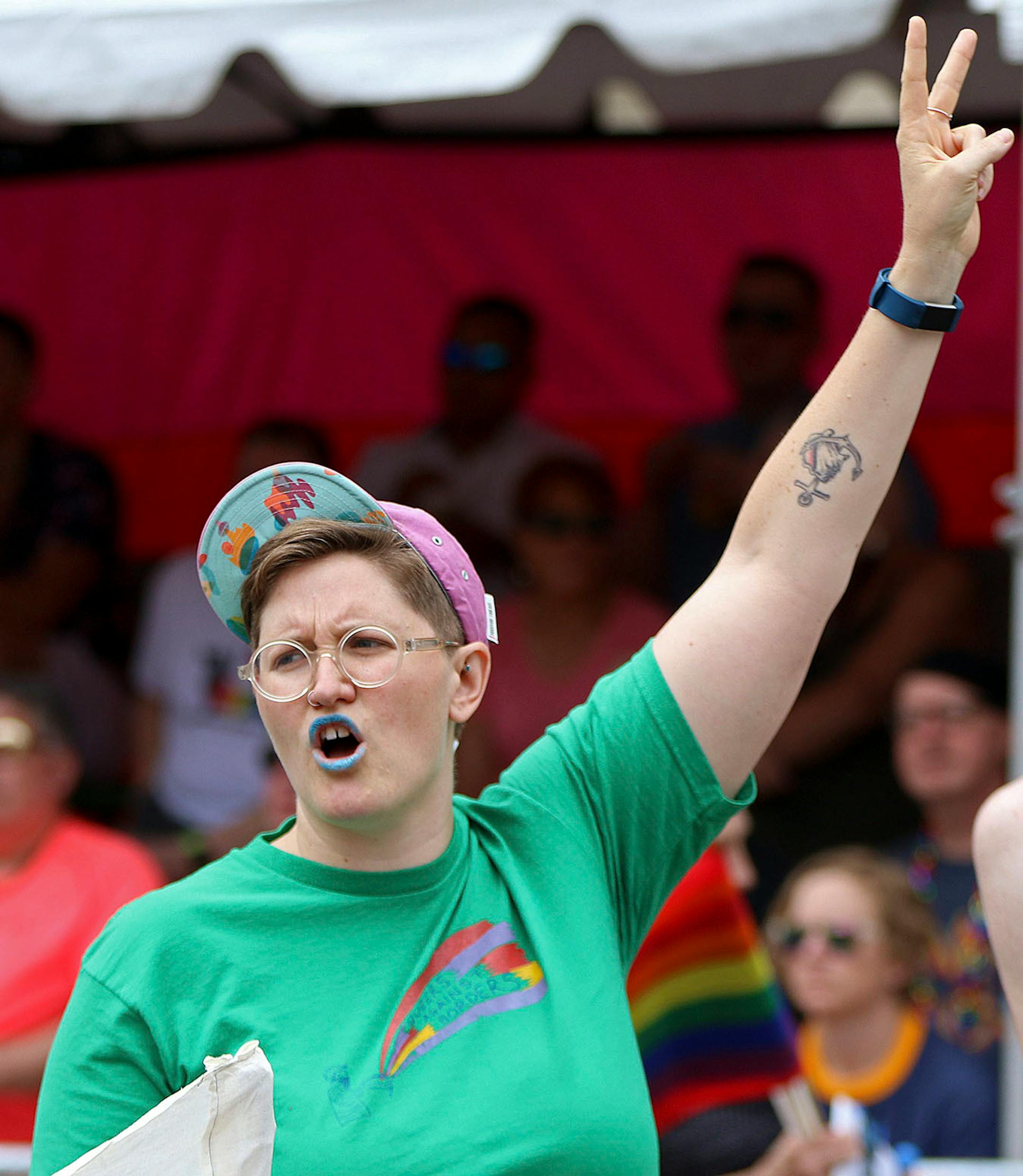 Erin Dorb chants with fellow protestors at the pride parade on Sunday.